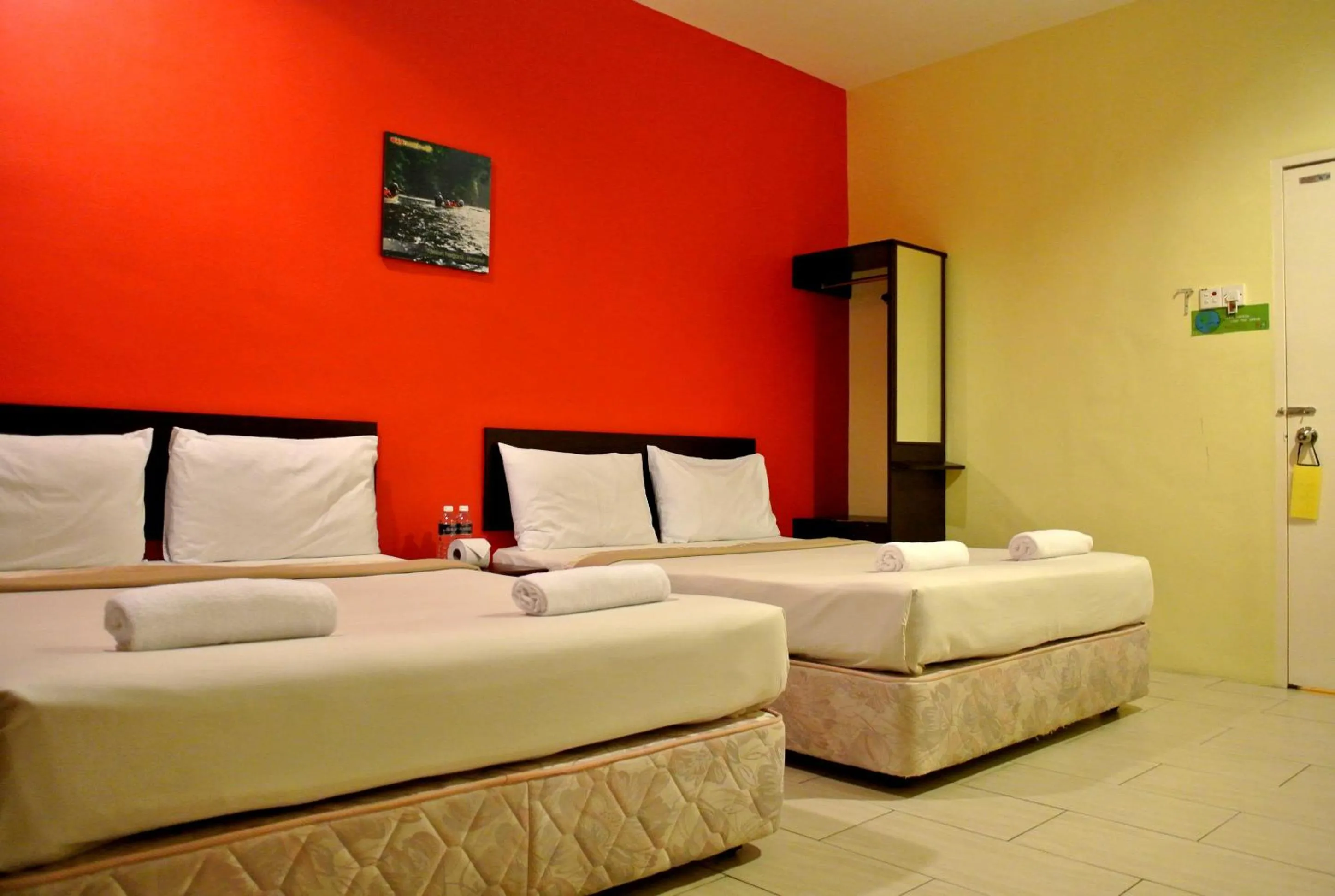 Bed in Wau Hotel & Cafe