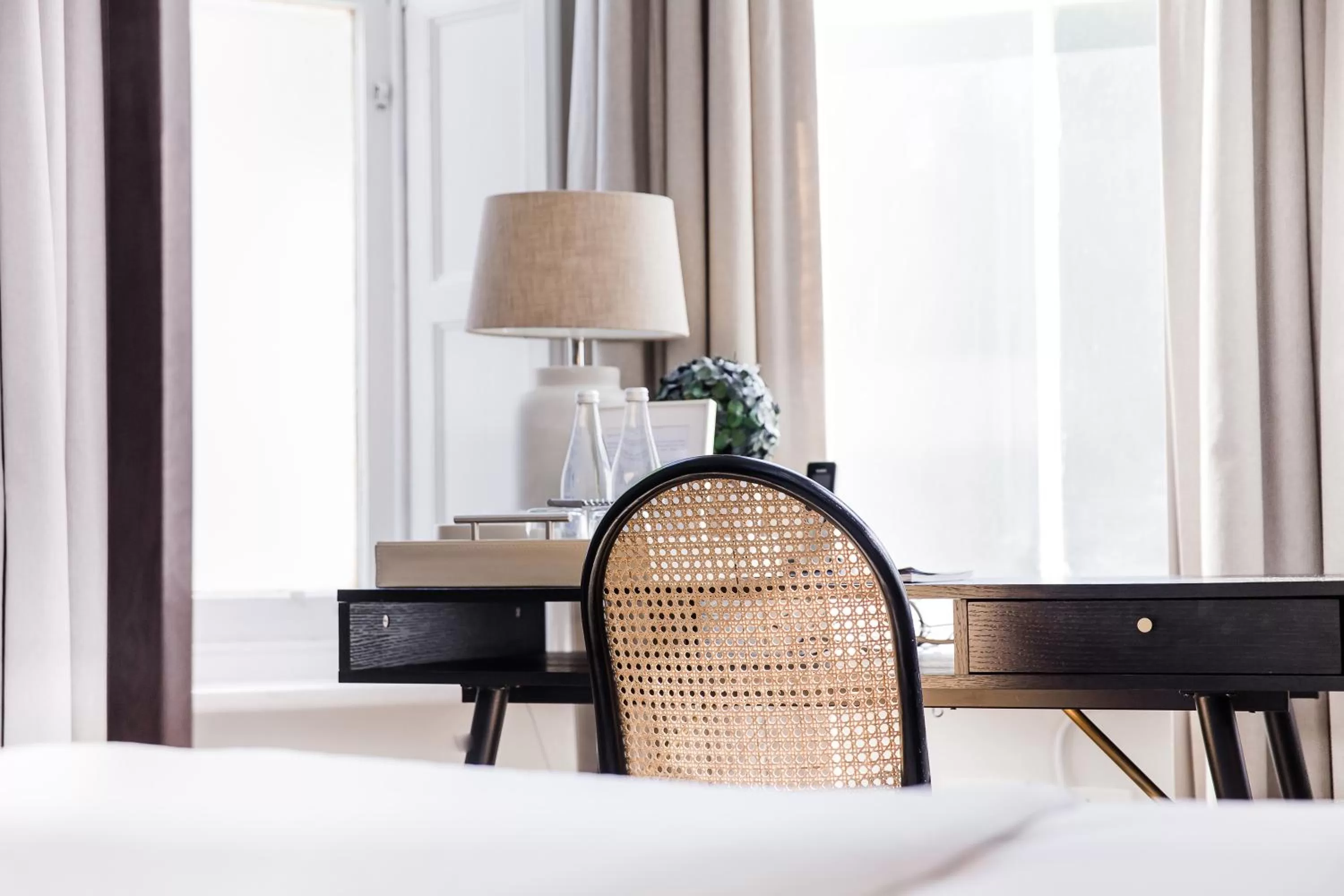 Decorative detail, Bed in River Manor Boutique Hotel by The Living Journey Collection