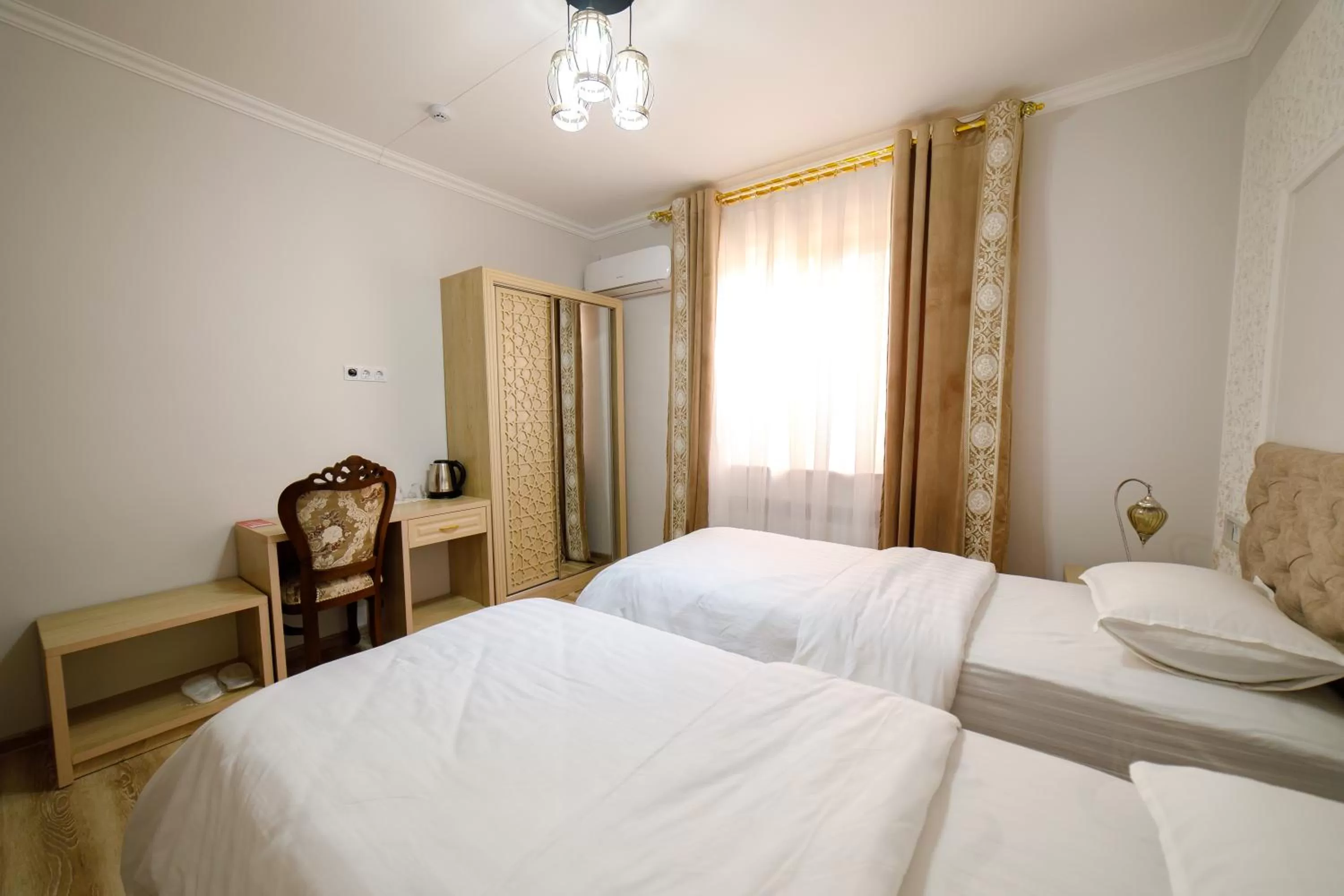 Bed in Khans Palace Hotel