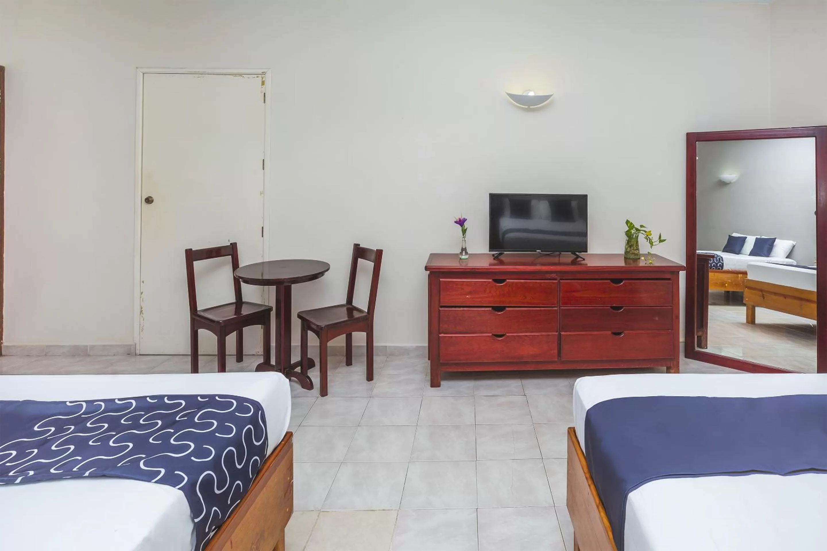 Bed in Hotel Kiin Cozumel