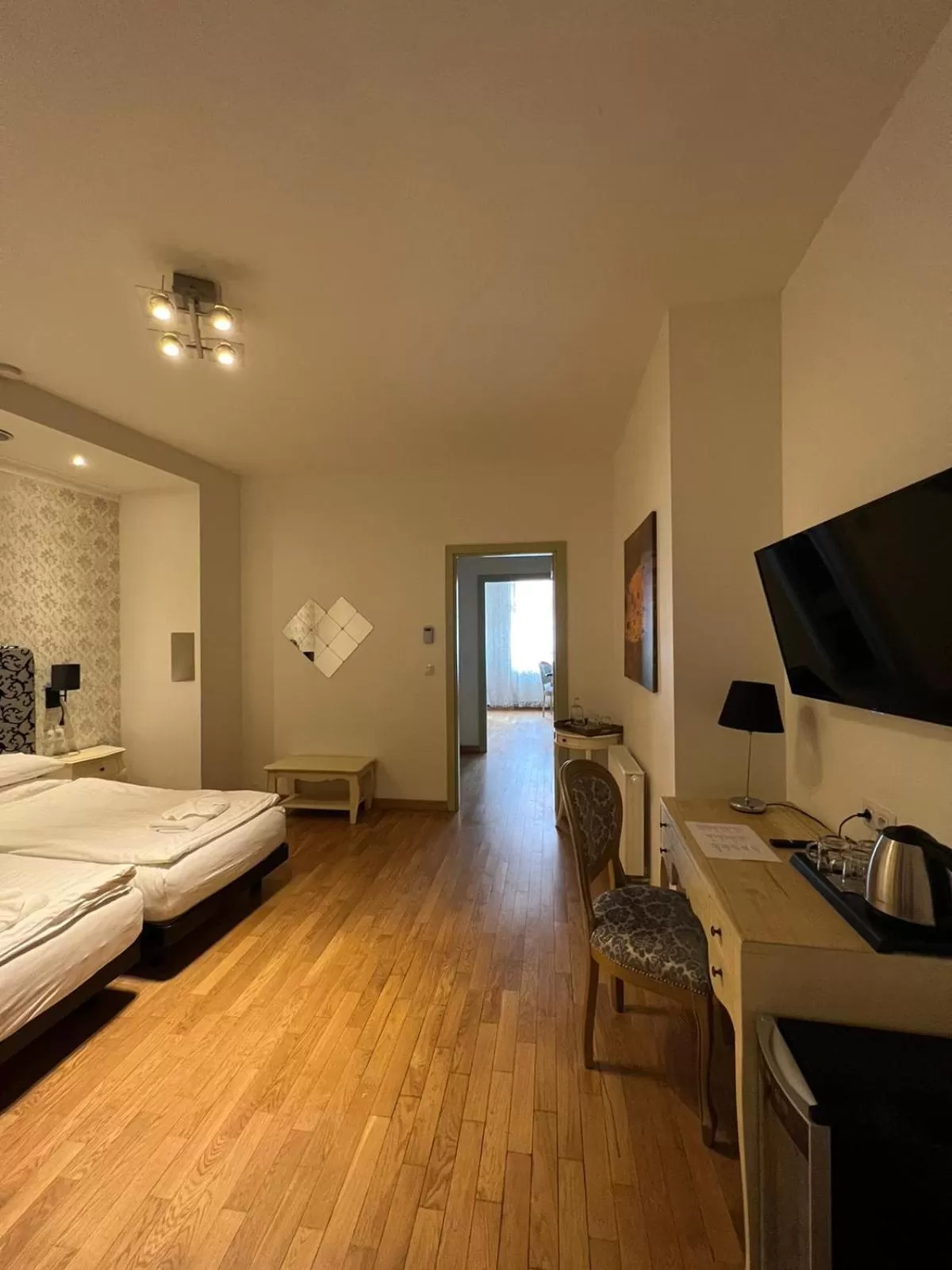 Bed in Dolce Vita Suites Boutique