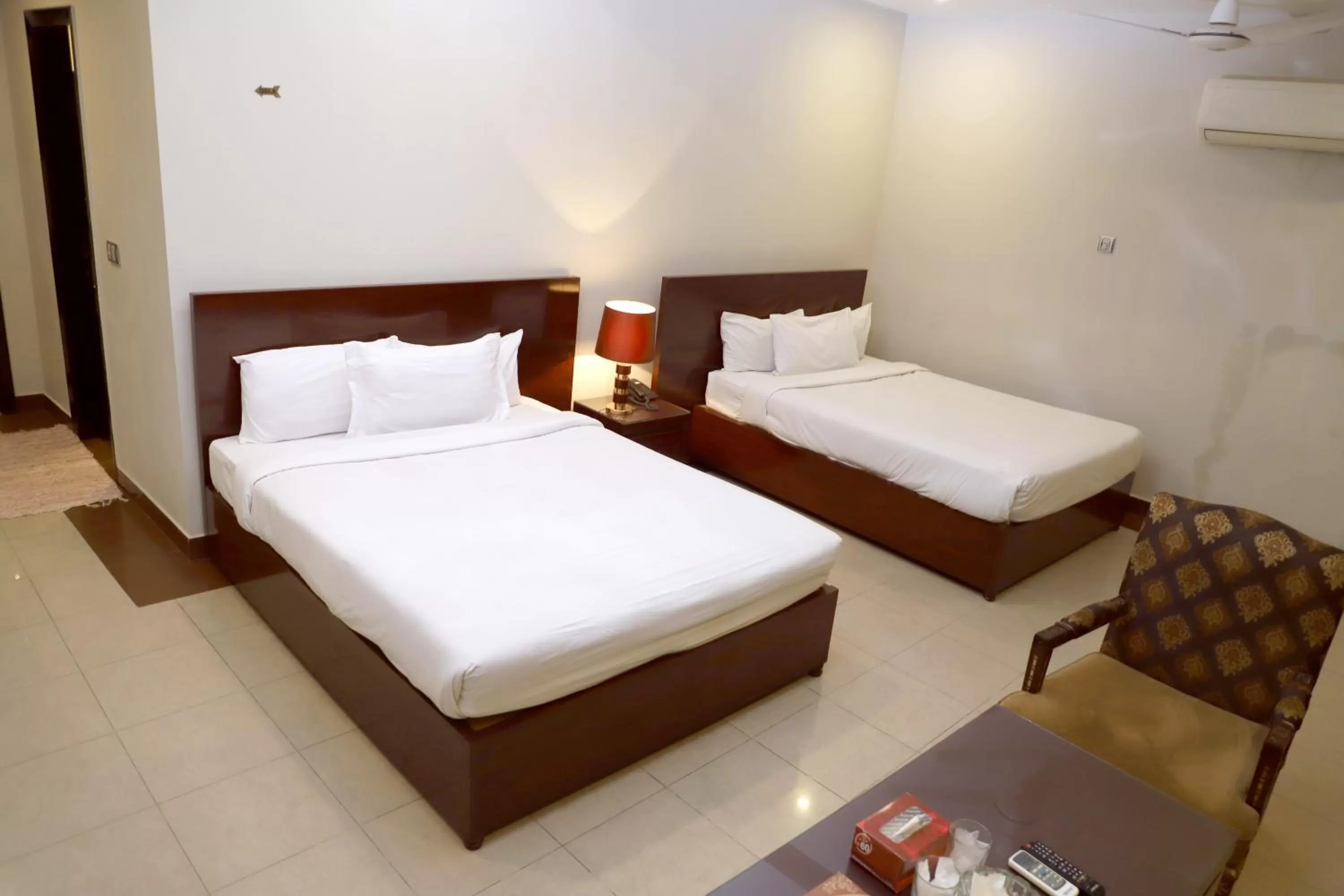 Bed in Hotel Multan Continental