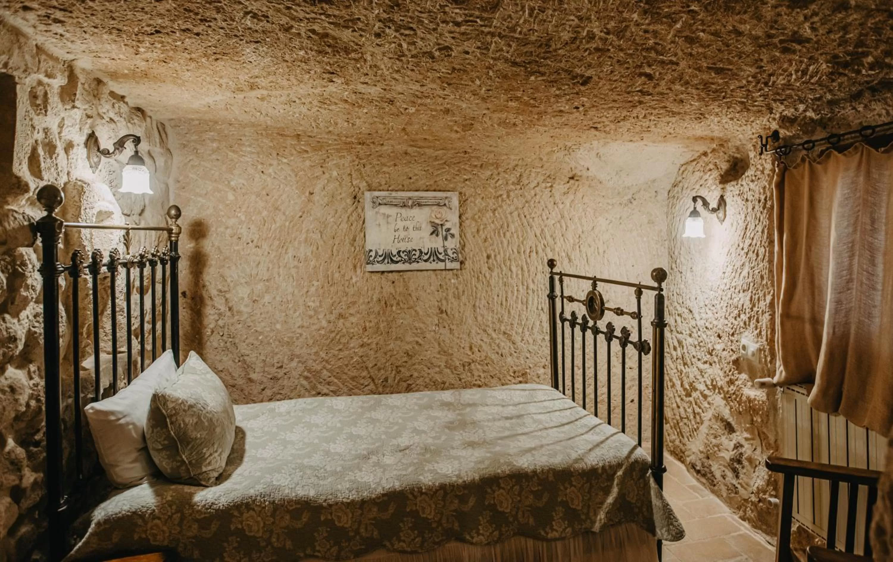Bed in Melekler Evi Cave Hotel