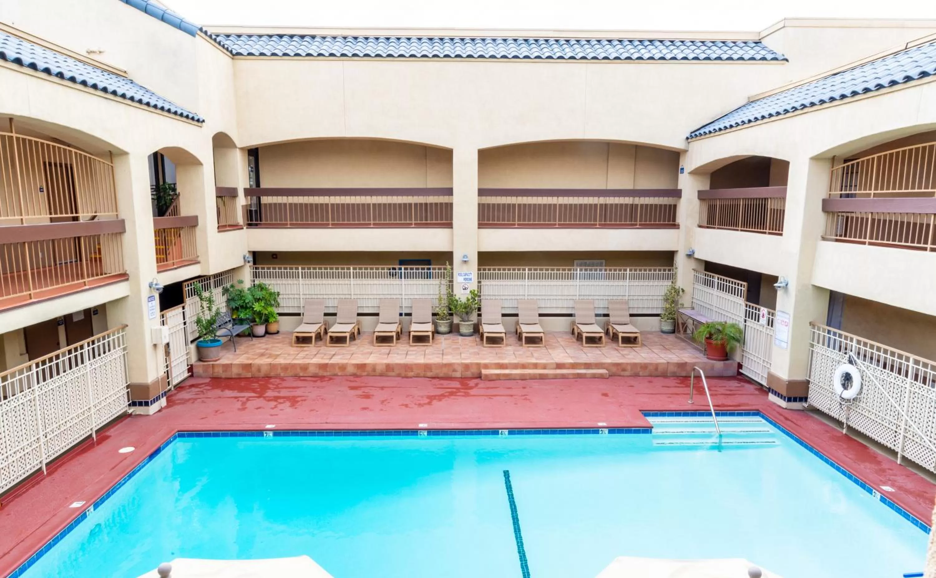 Swimming pool in Days Inn & Suites by Wyndham Artesia
