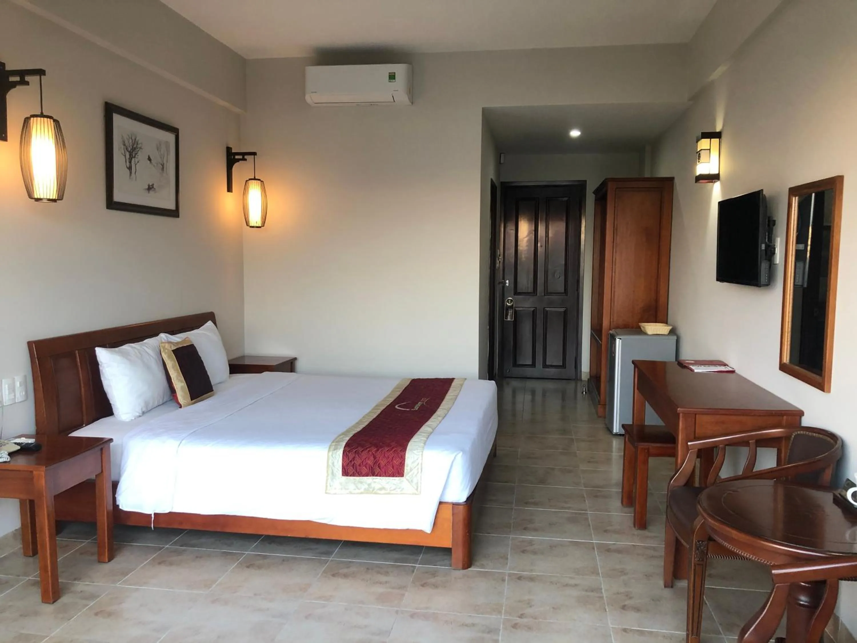 Bed in Sunshine Hoian Hotel