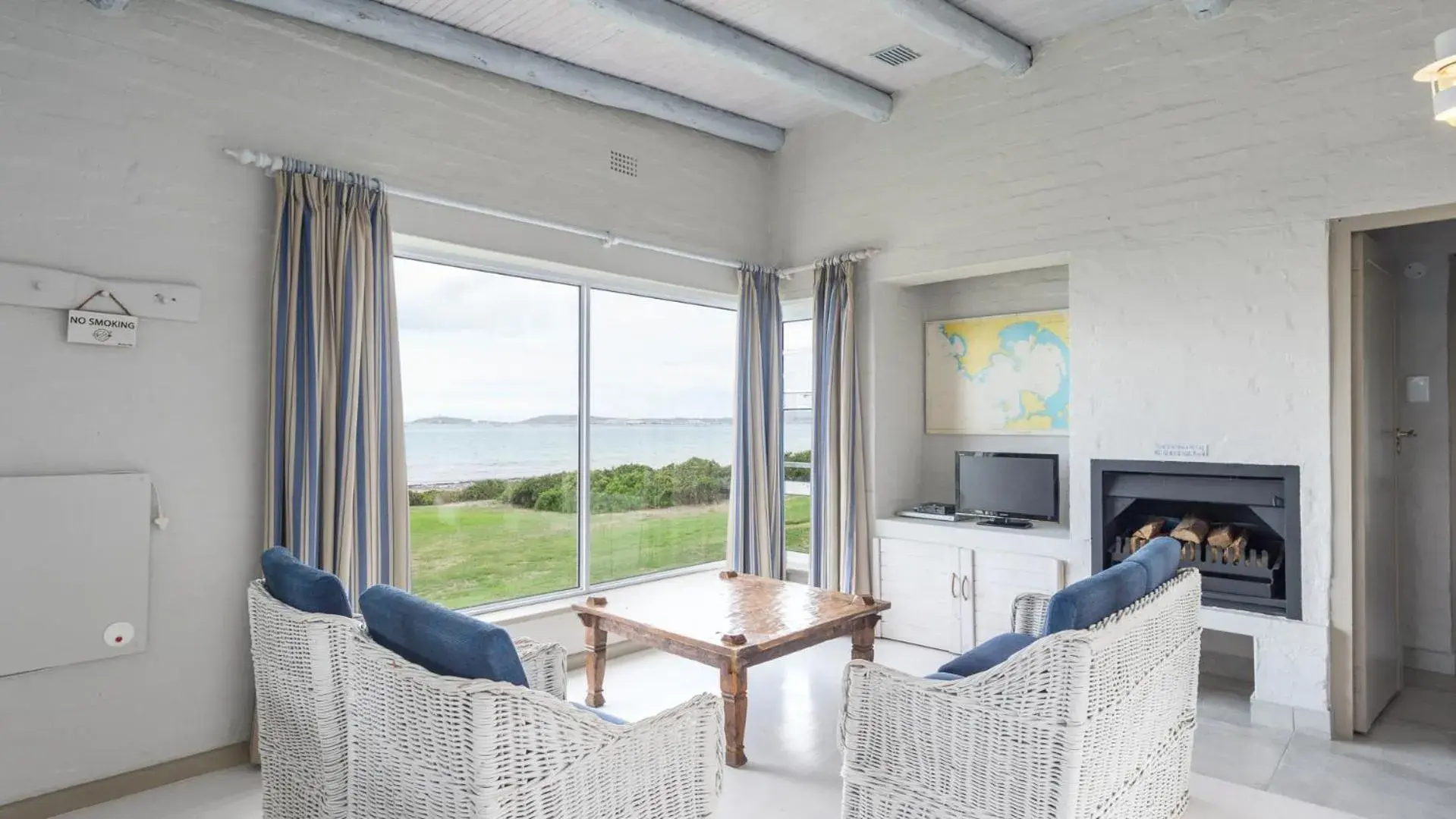 Two-Bedroom Cottage with Sea View (4 Adults) in Blue Bay Lodge Two-Bedroom Cottage with Sea View (4 Adults) in Blue Bay Lodge