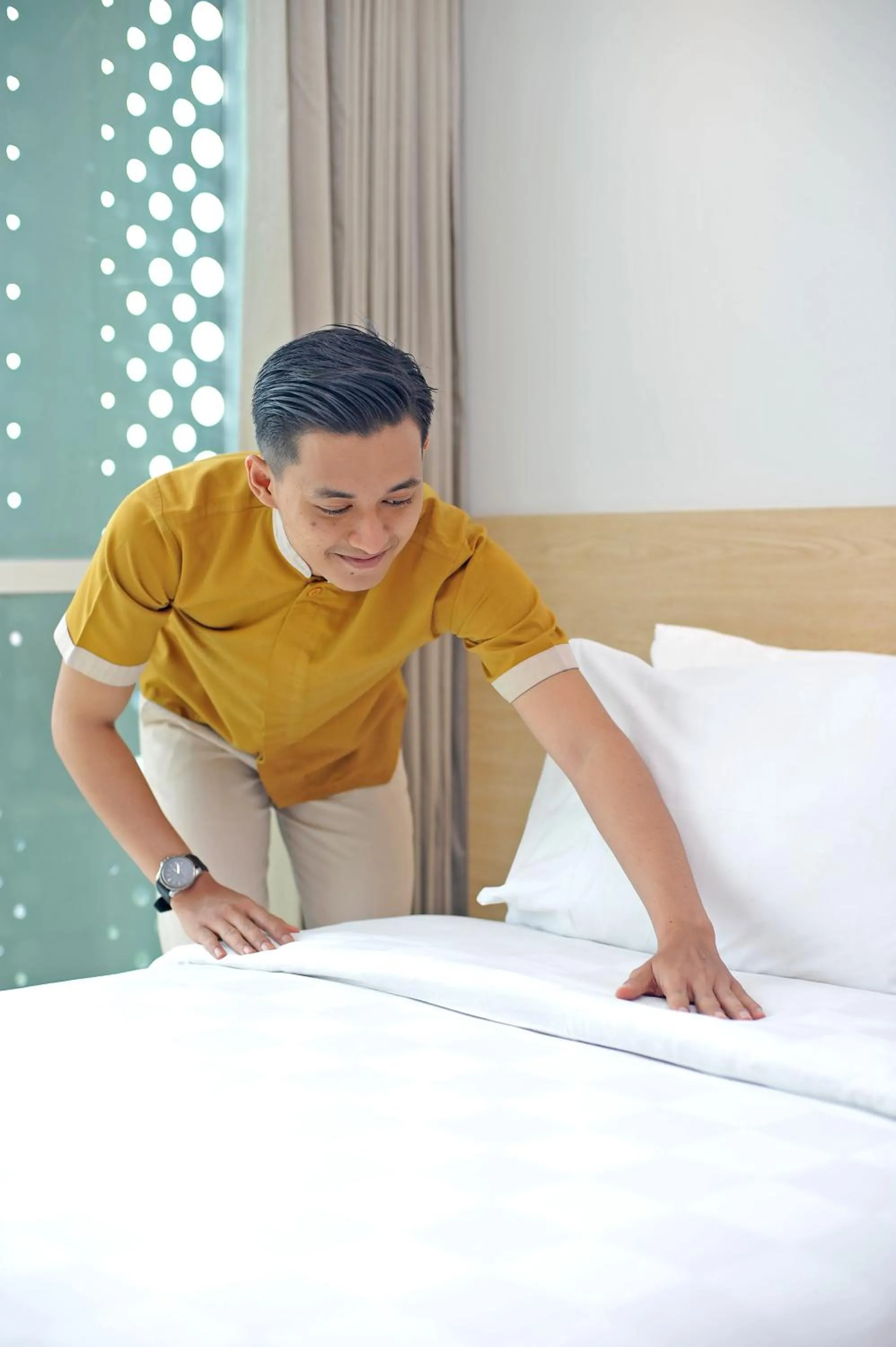 Staff, Bed in Midtown Residence Surabaya