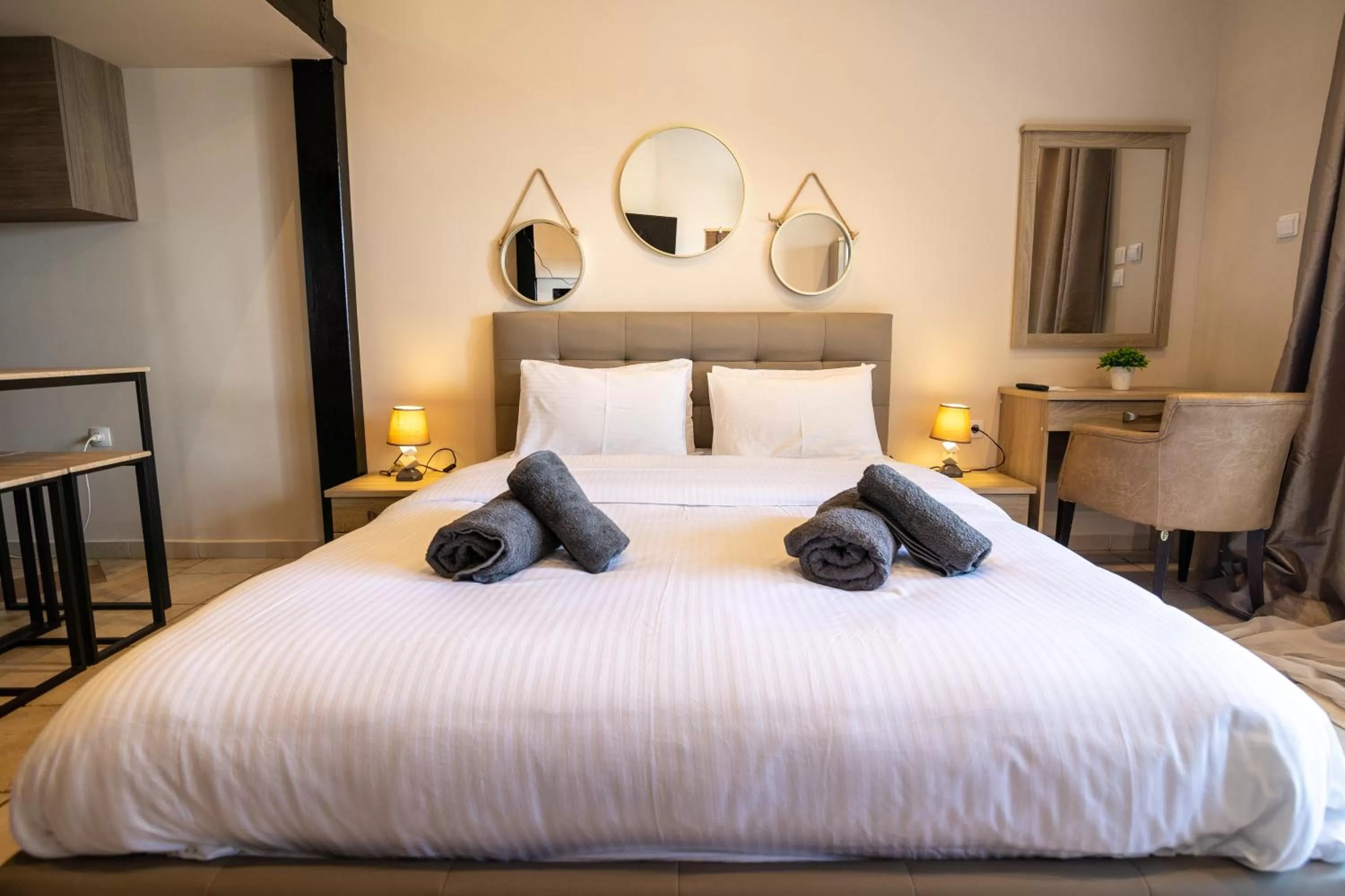 Bed in Votsalakia Hotel & Luxury Apartments