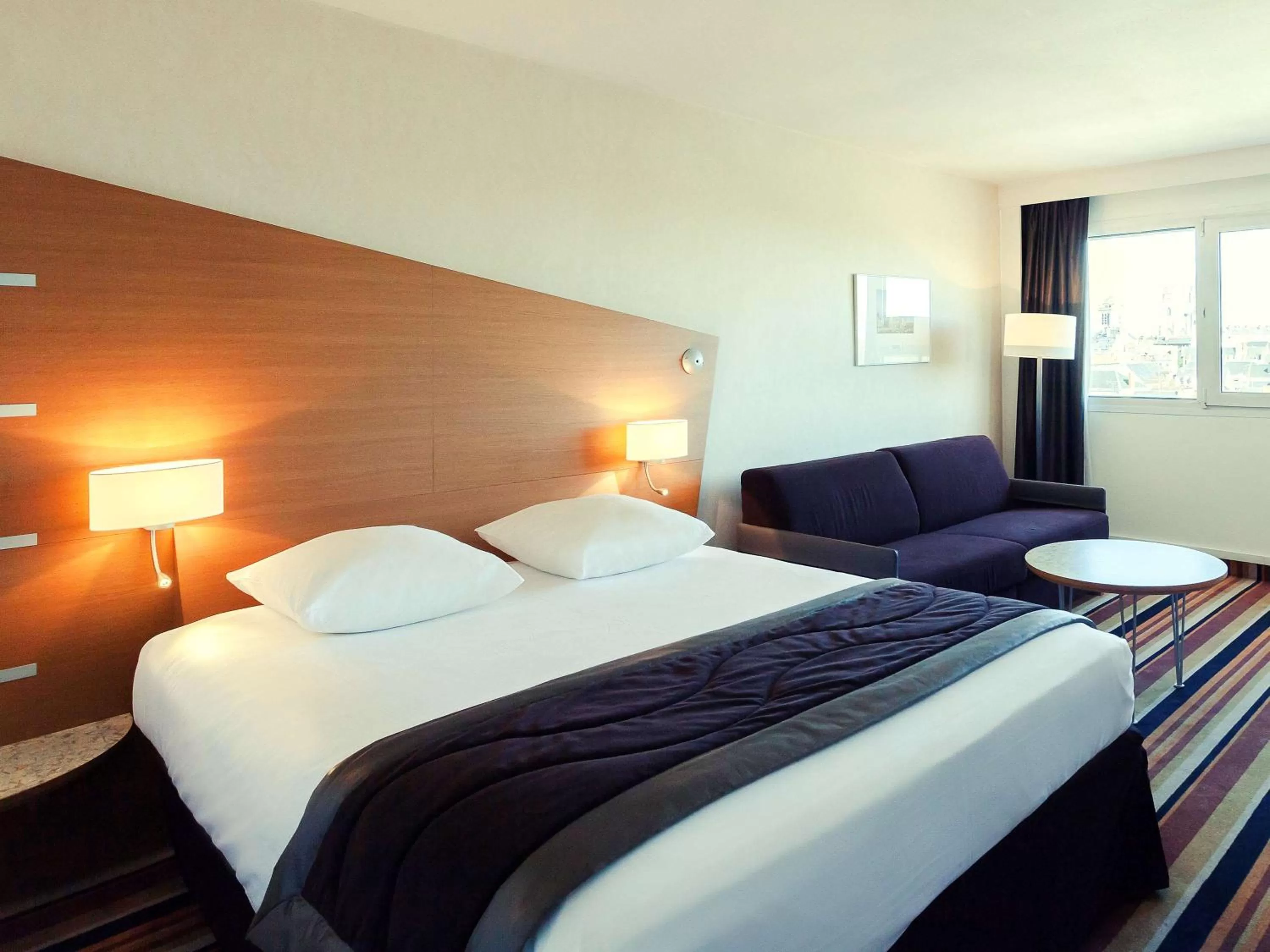 Photo of the whole room, Bed in Mercure Orléans Centre Bords de Loire