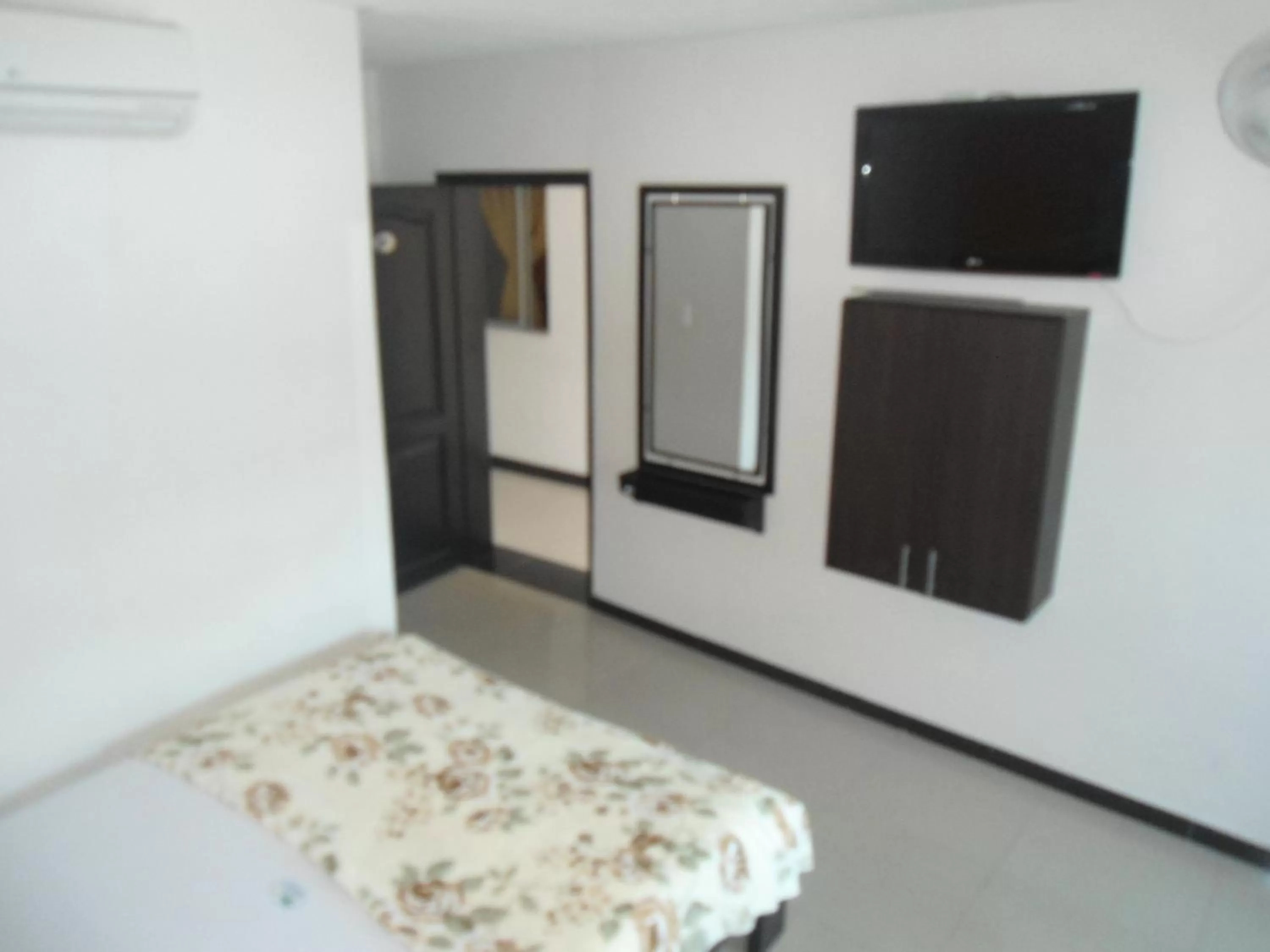 TV and multimedia, TV/Entertainment Center in Hotel Palmeras De Mariana