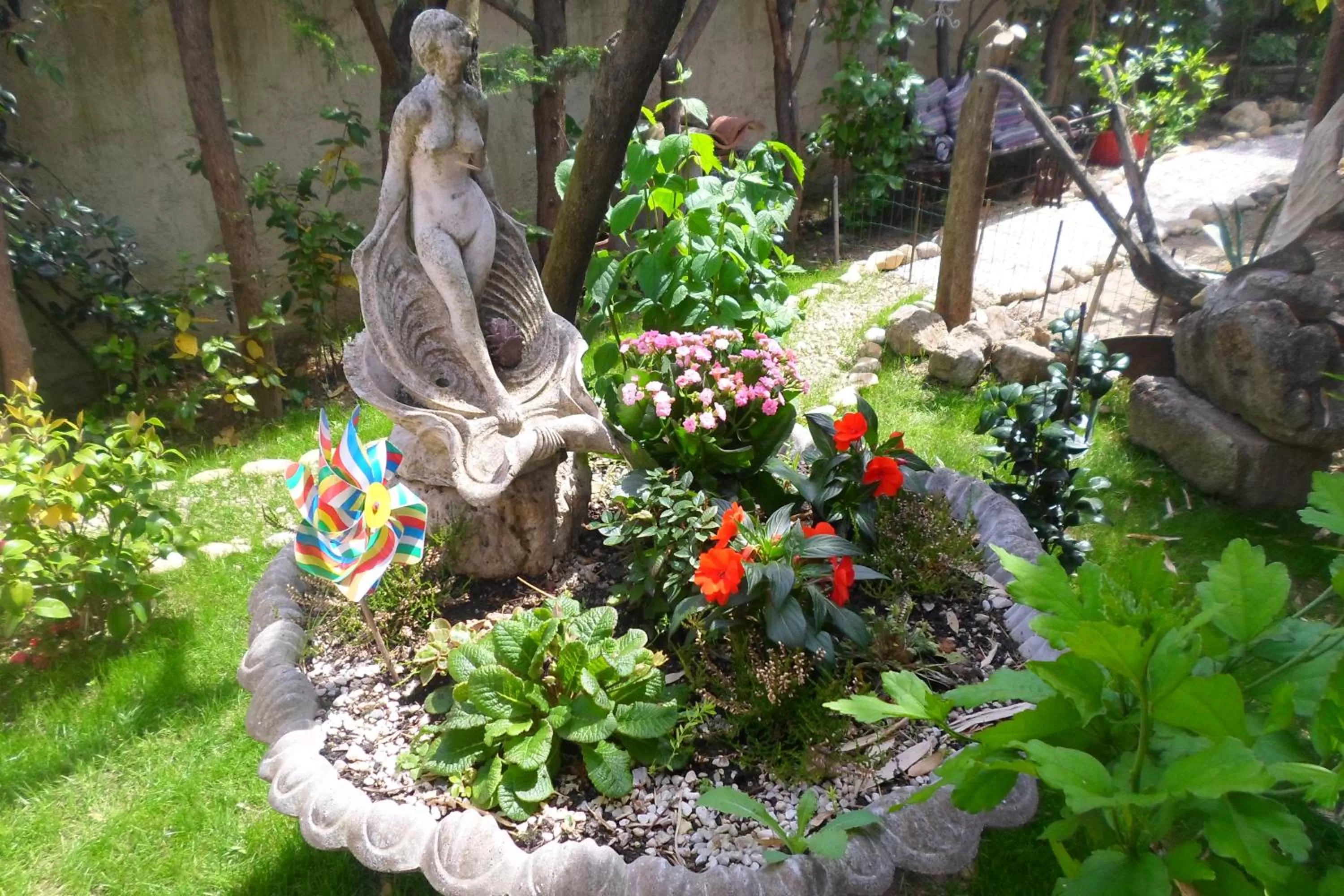 Garden in La Sapiniére -chambres climatisées