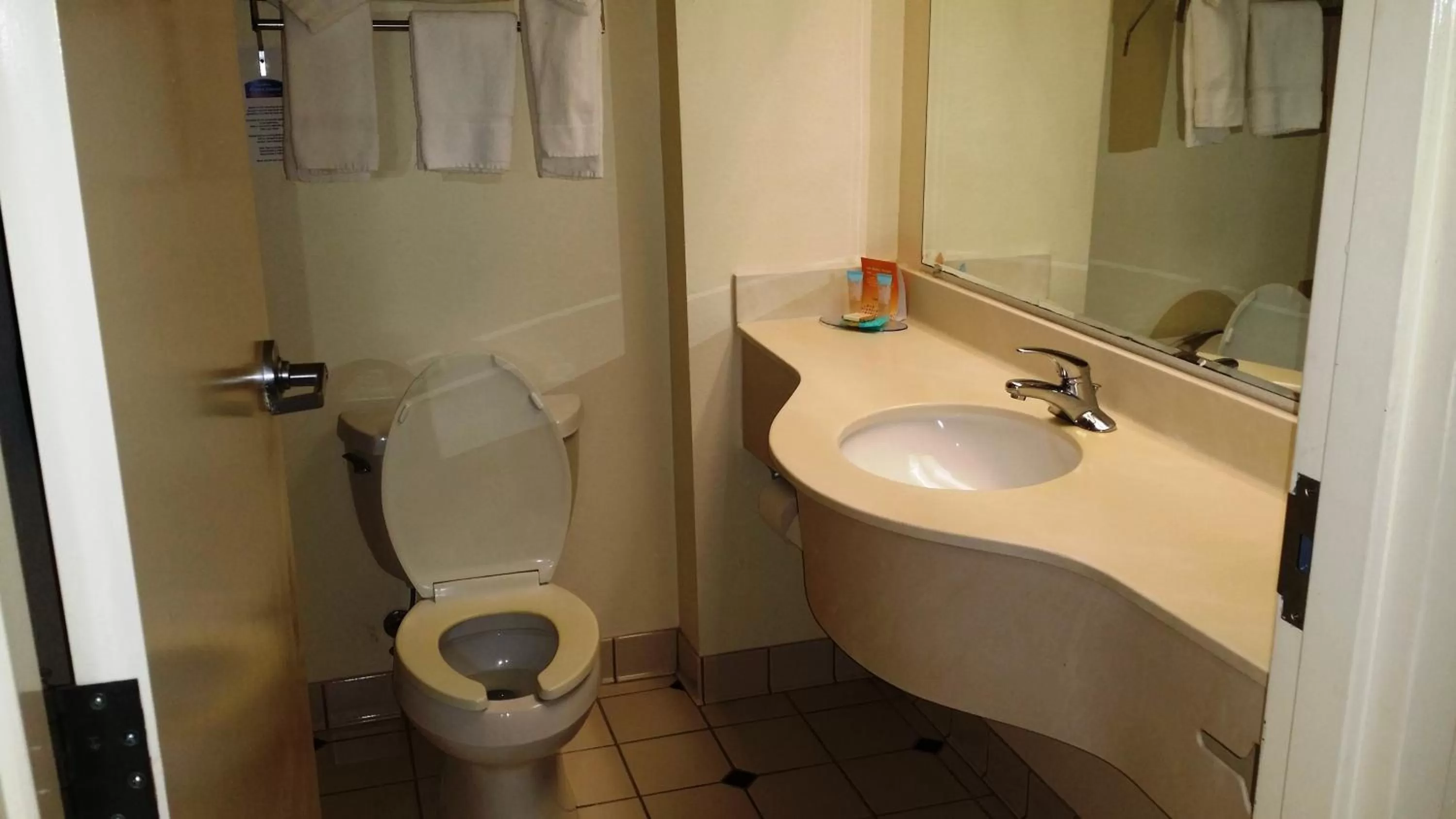 Toilet in Opal Hotel & Suites