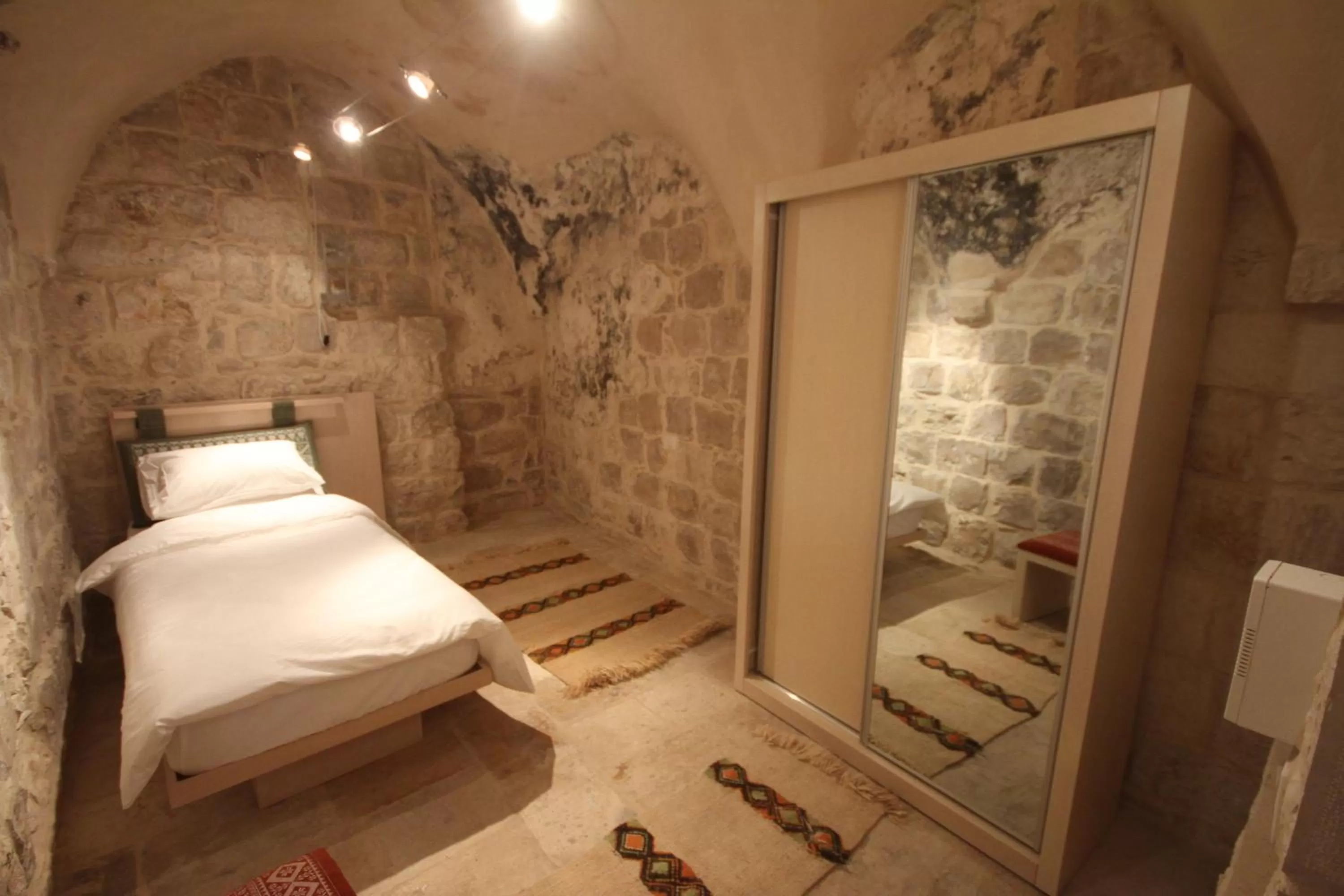 Bed in Khan Alwakala Hotel