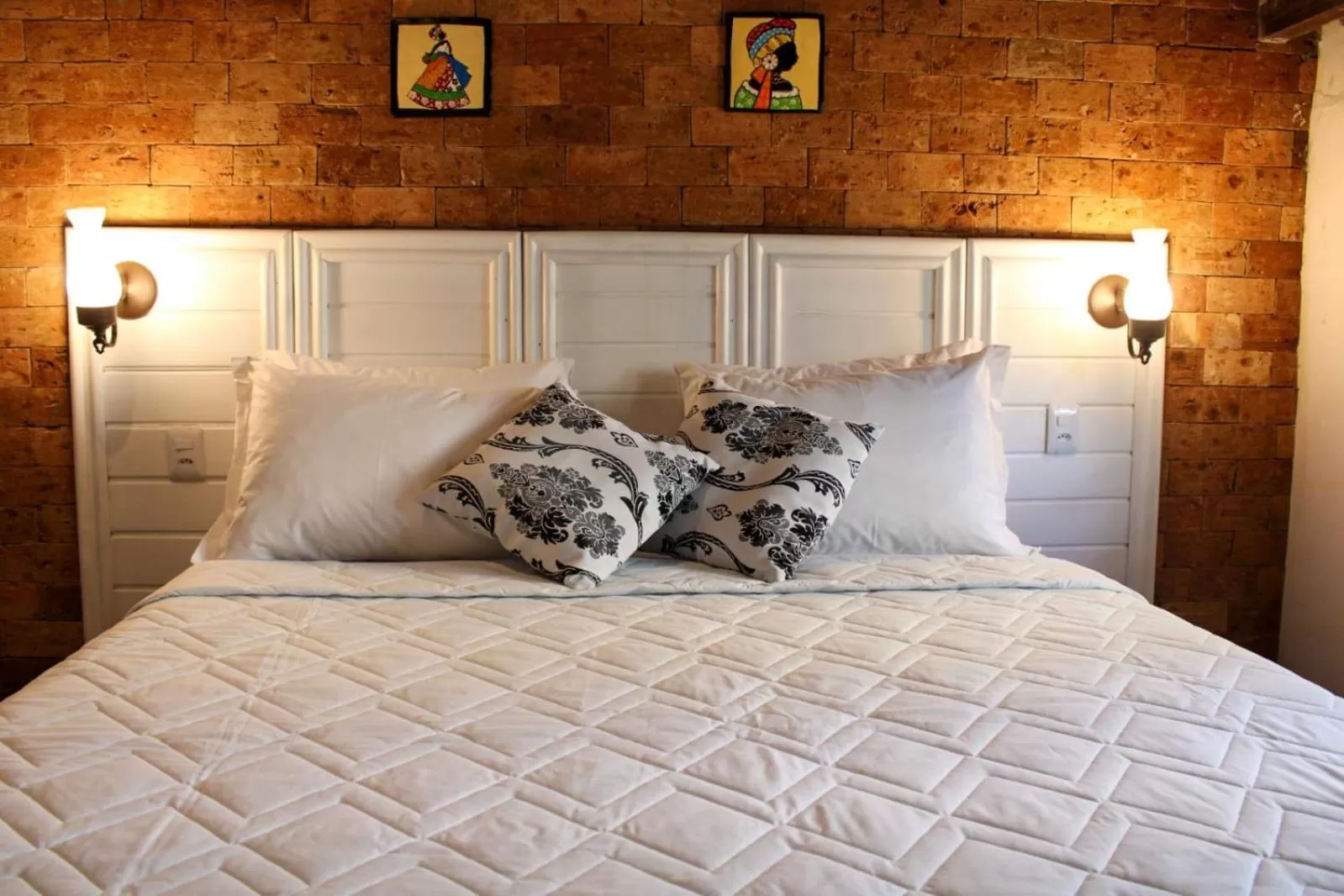 Bed in Pousada dos Hibiscus