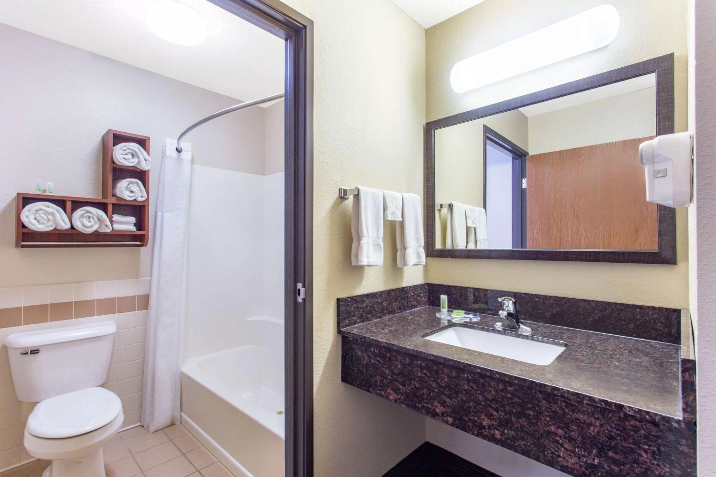 Bathroom in AmericInn by Wyndham New London