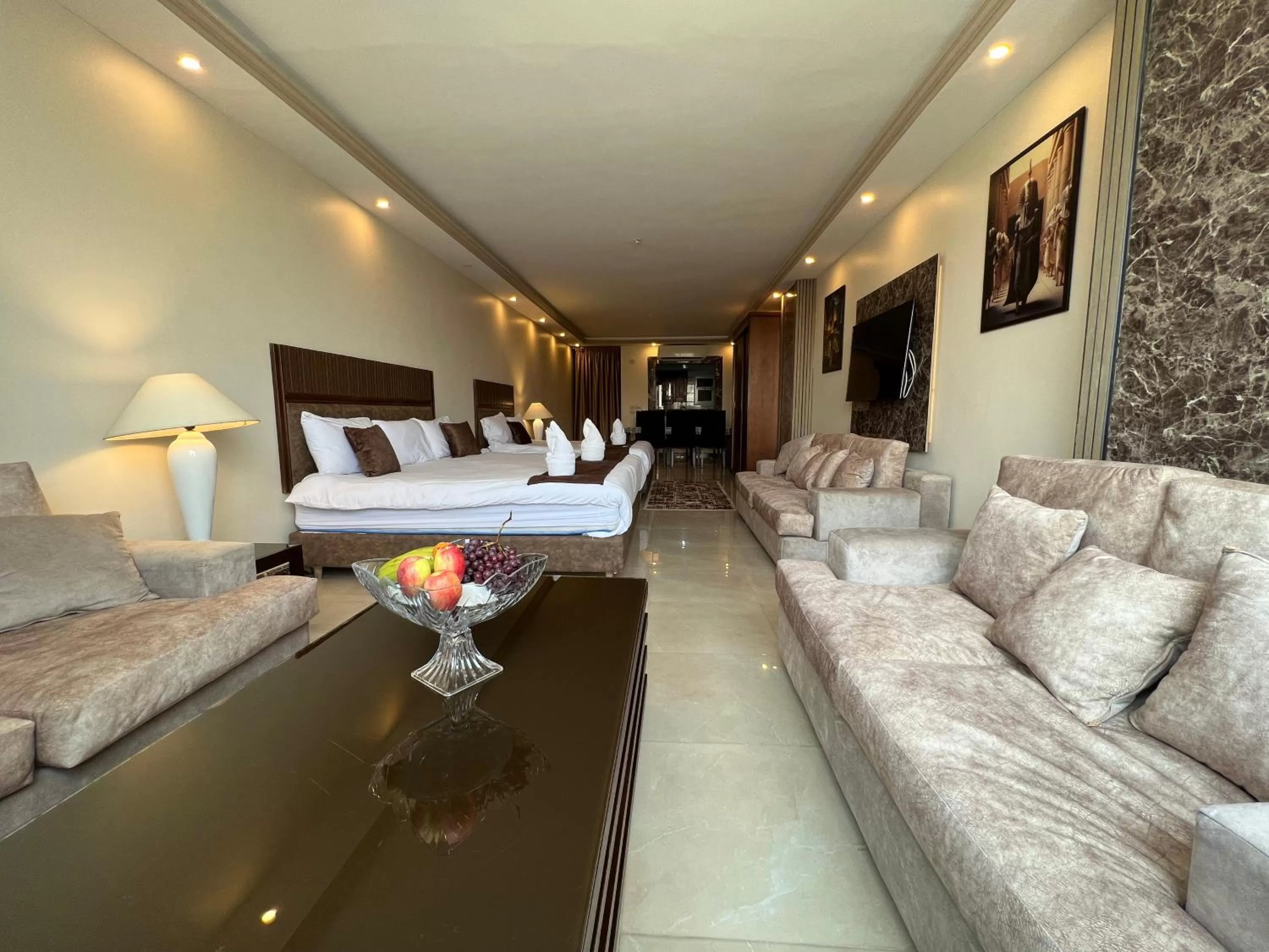 Bed, Seating Area in The Muse Pyramids