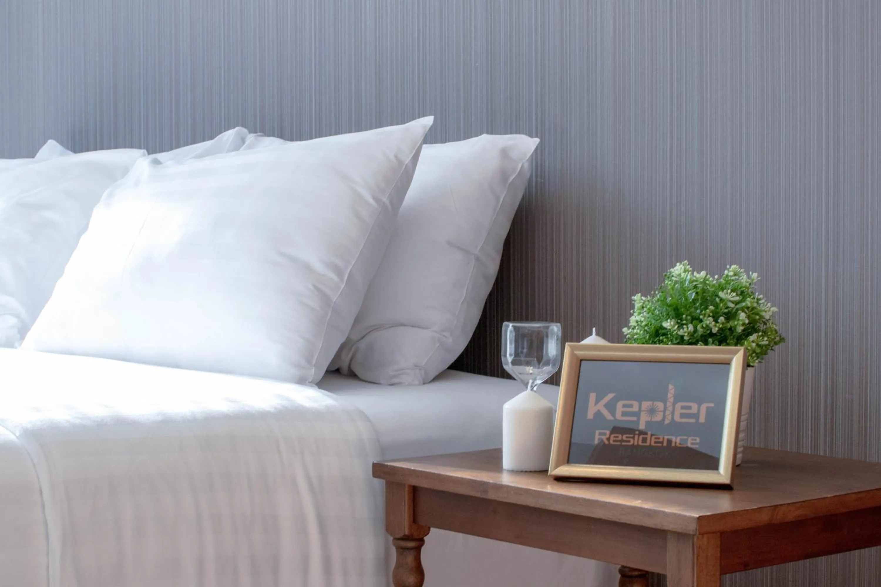 Bed in Kepler Residence Bangkok