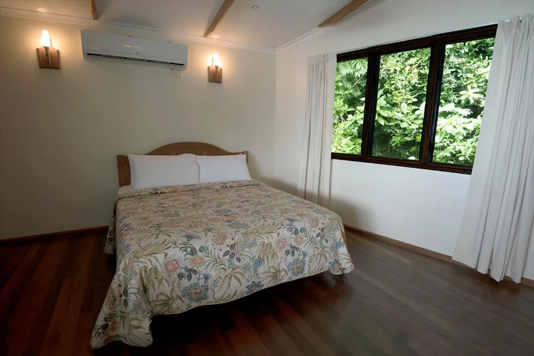 Bed in Tawali Leisure & Dive Resort