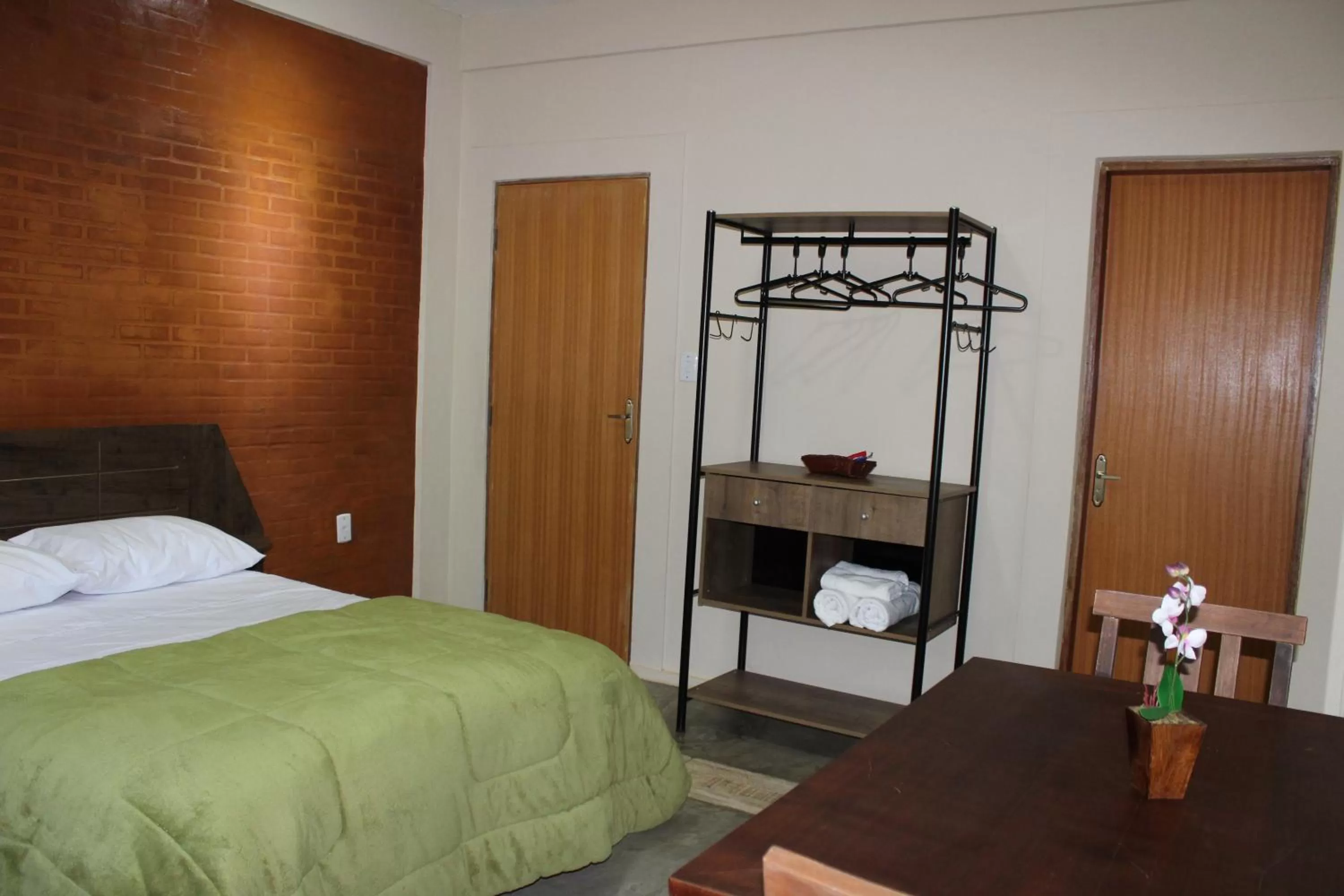 Bed in Pousada Morro dos Ventos