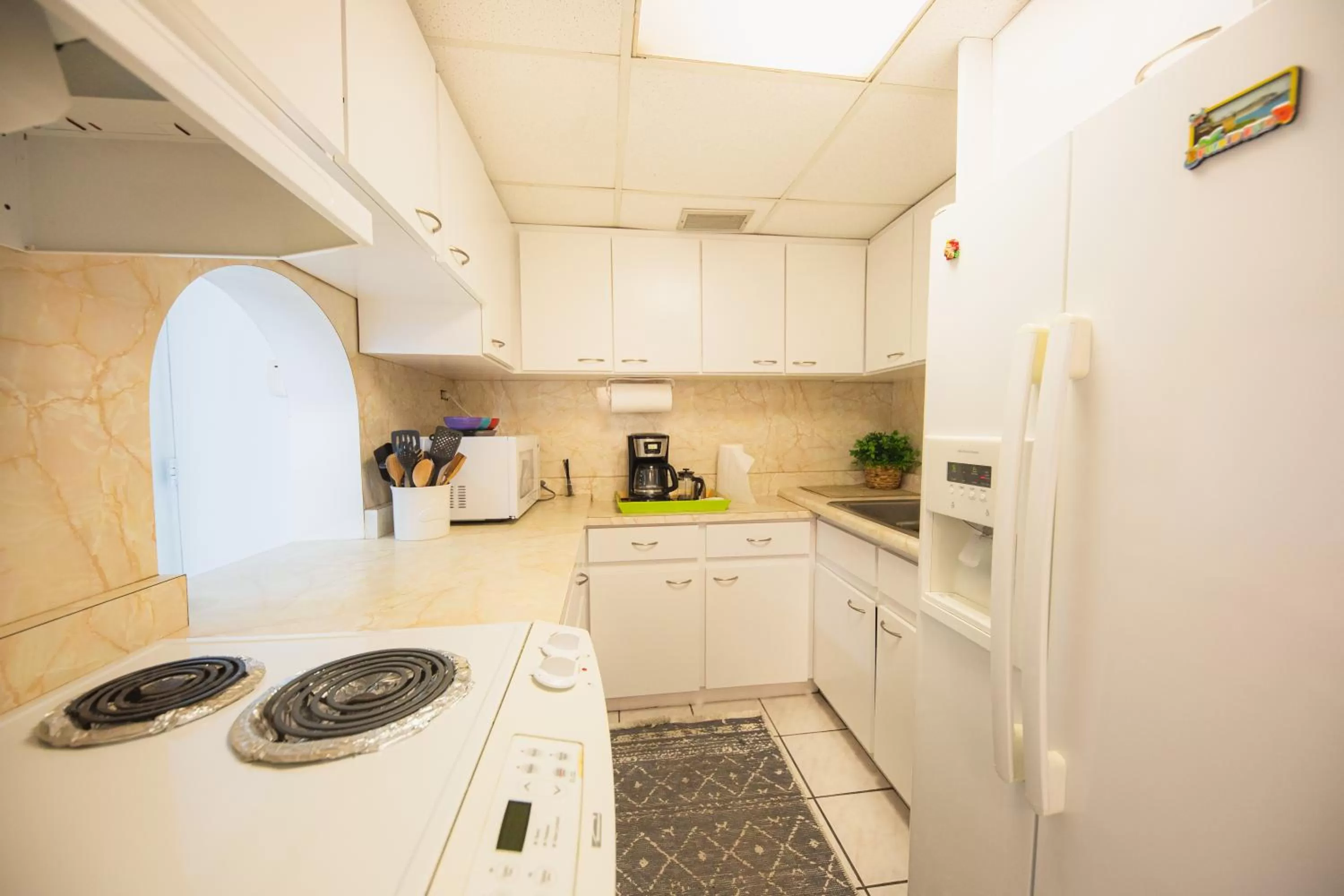 Coffee/tea facilities in ESJ Towers by Chana