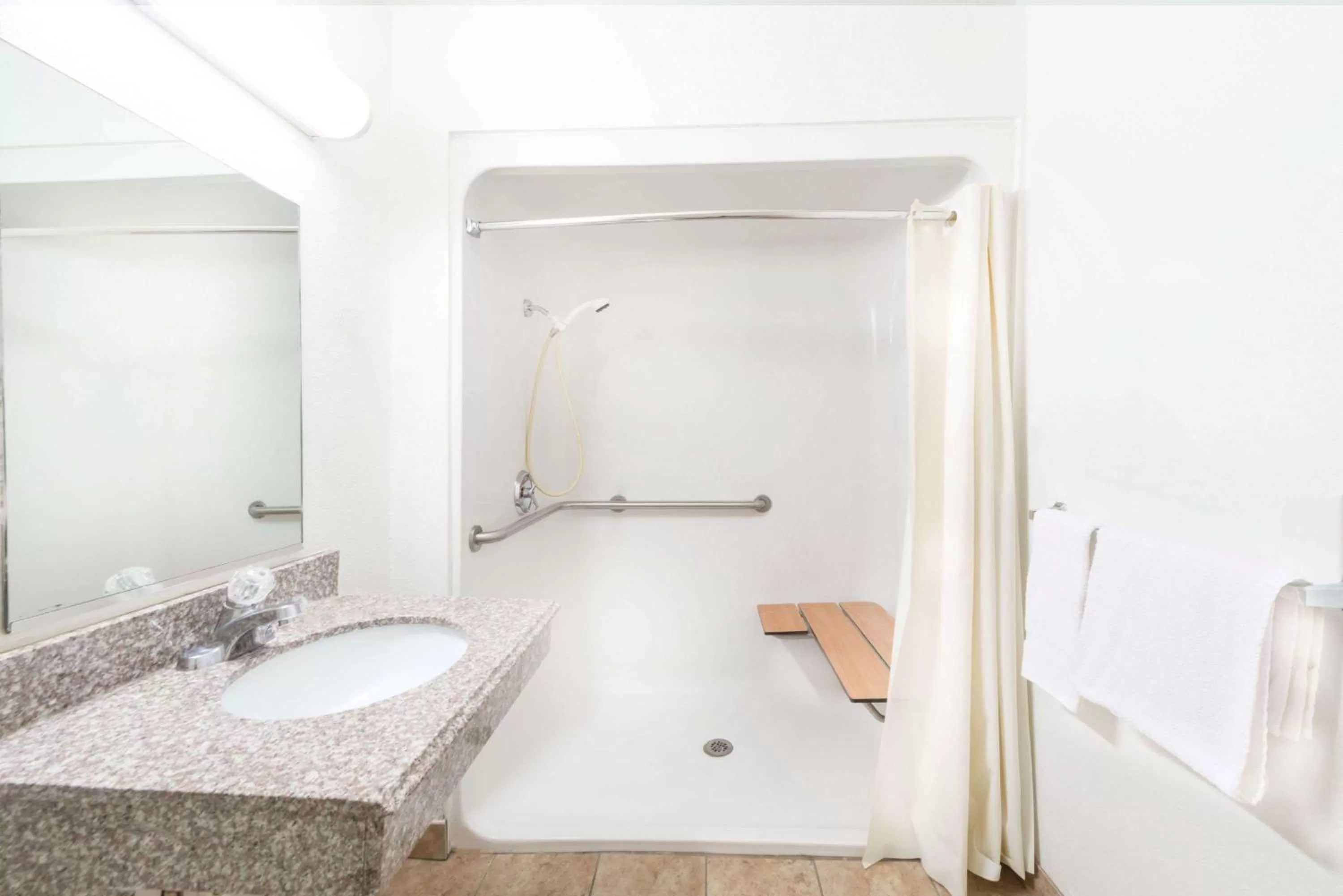 Bathroom in Super 8 by Wyndham Midwest City OK