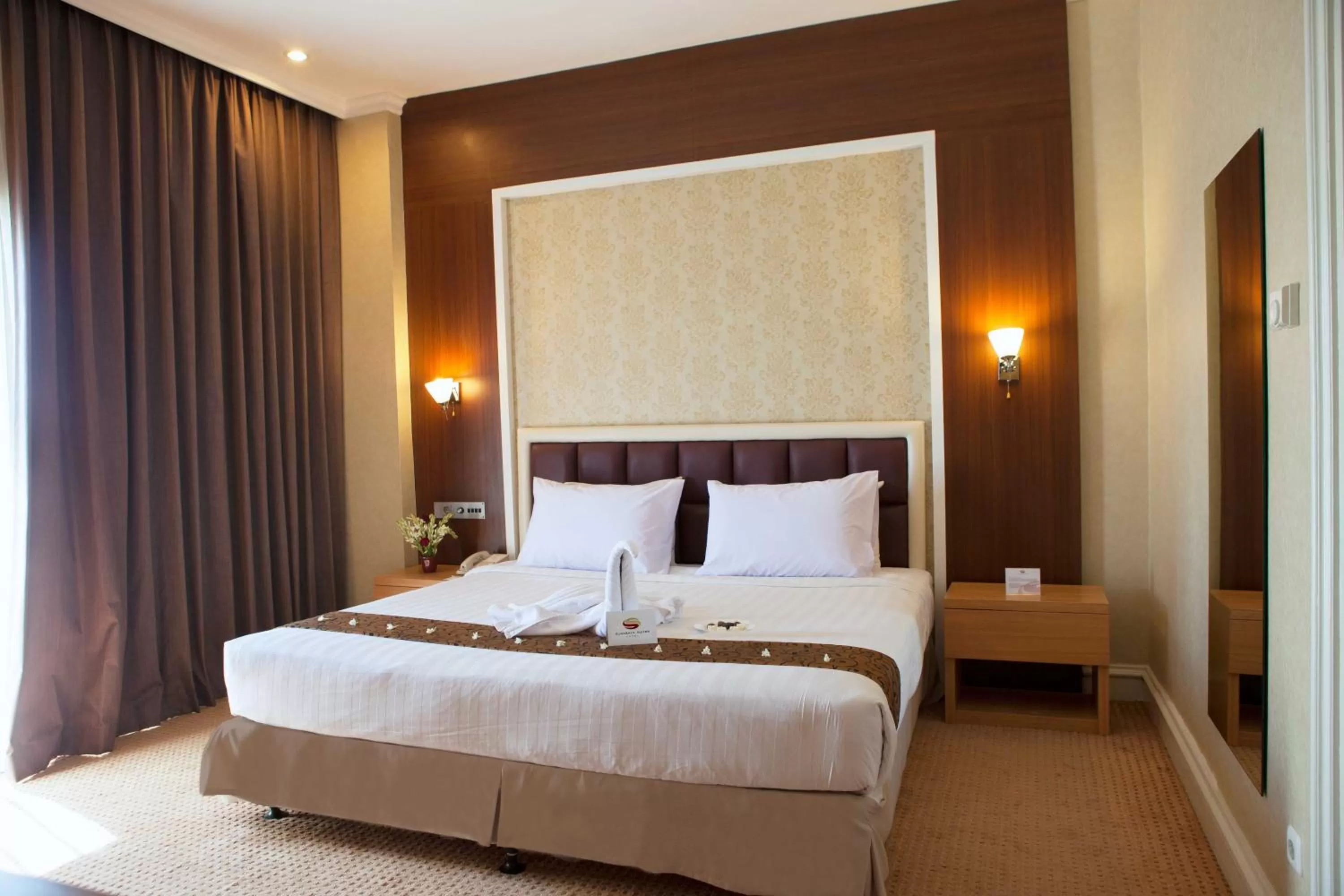 View (from property/room), Bed in Surabaya Suites Hotel Powered by Archipelago