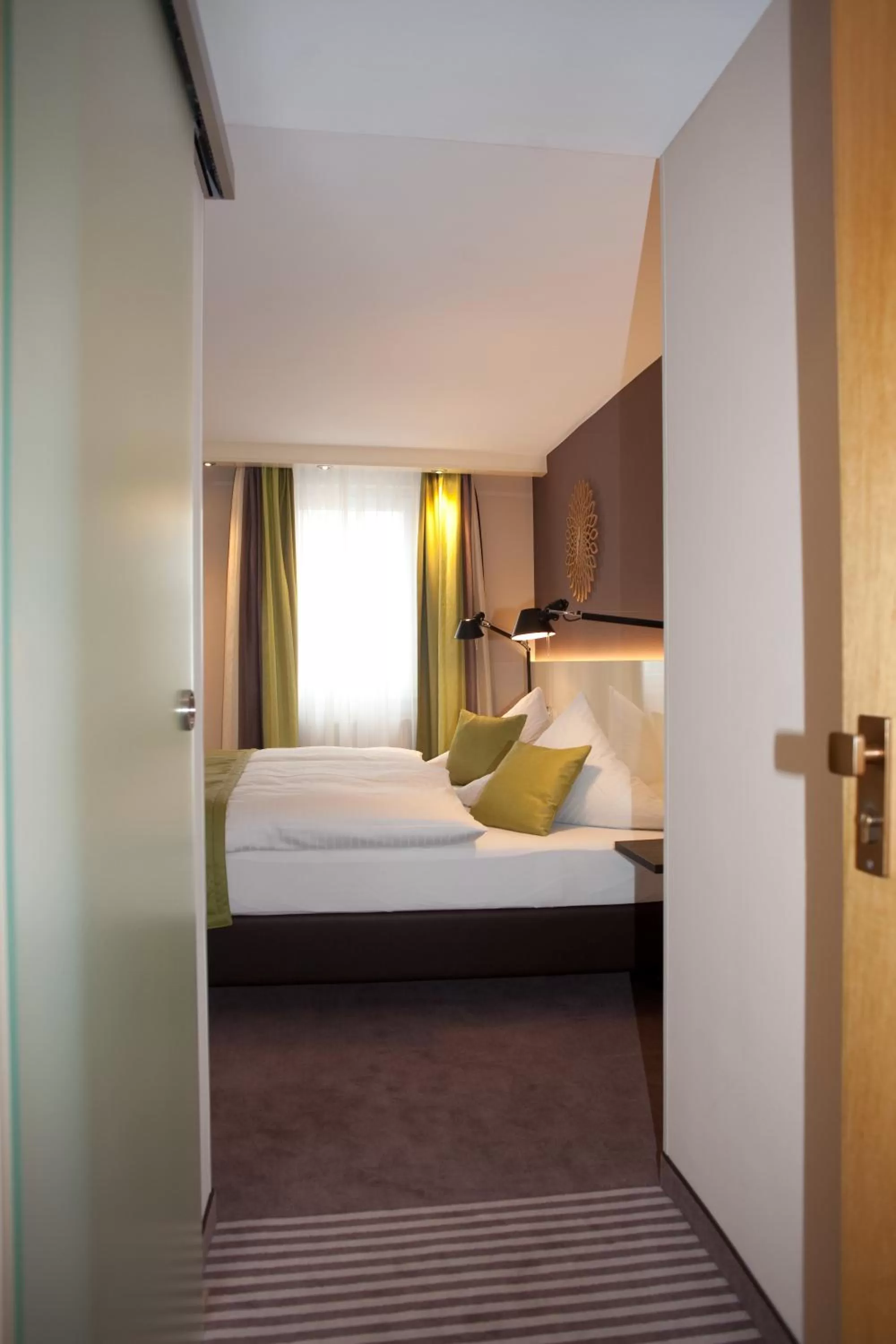 Bed in Hotel-Restaurant Arneggers Adler