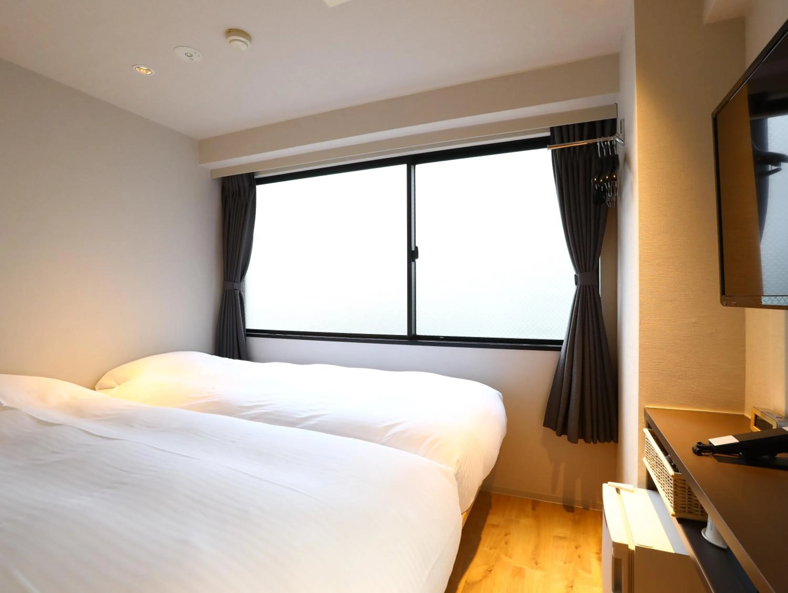Photo of the whole room, Bed in Hotel Wing International Korakuen