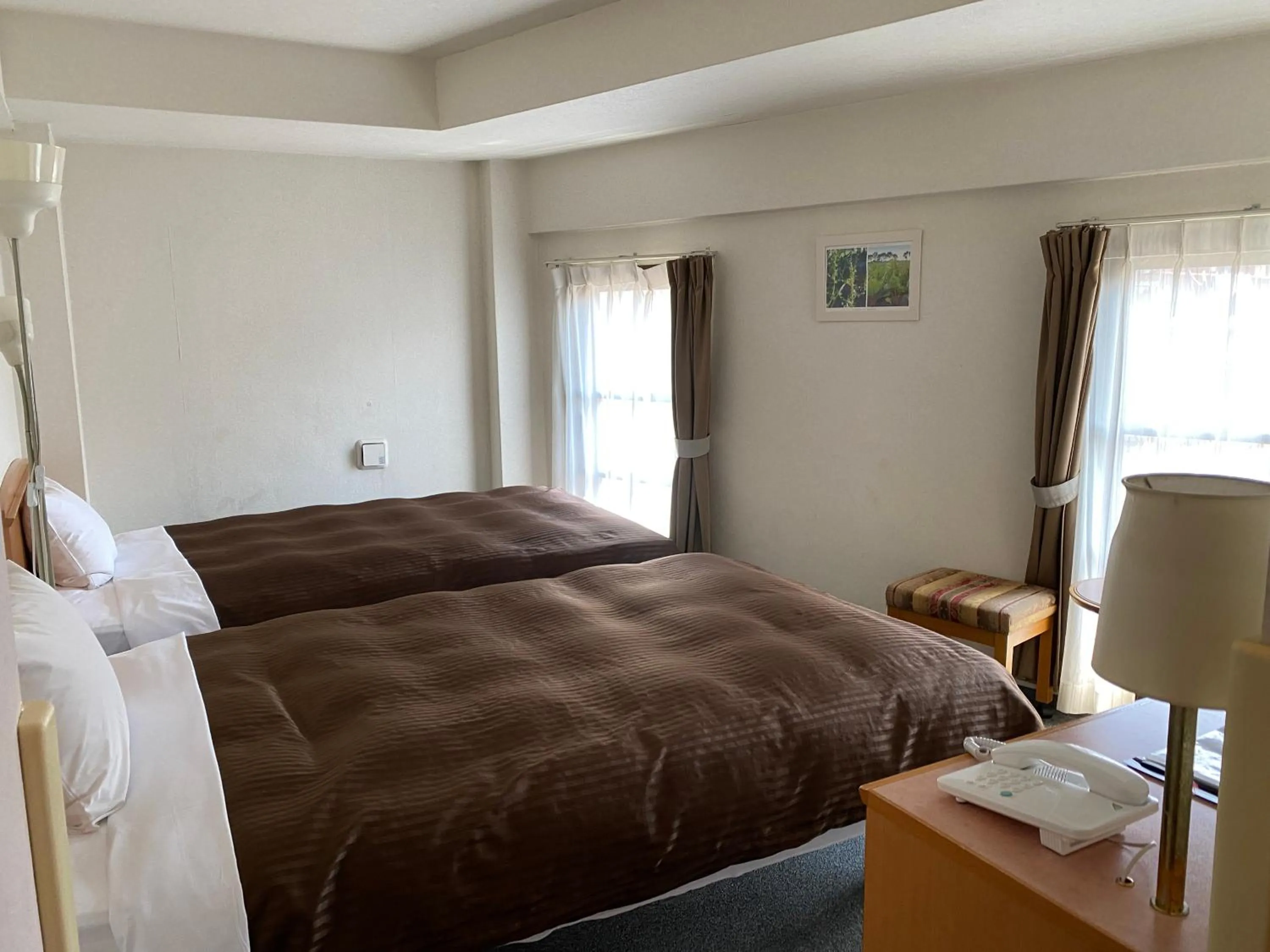 Bed in Sakura Hotel Hatagaya