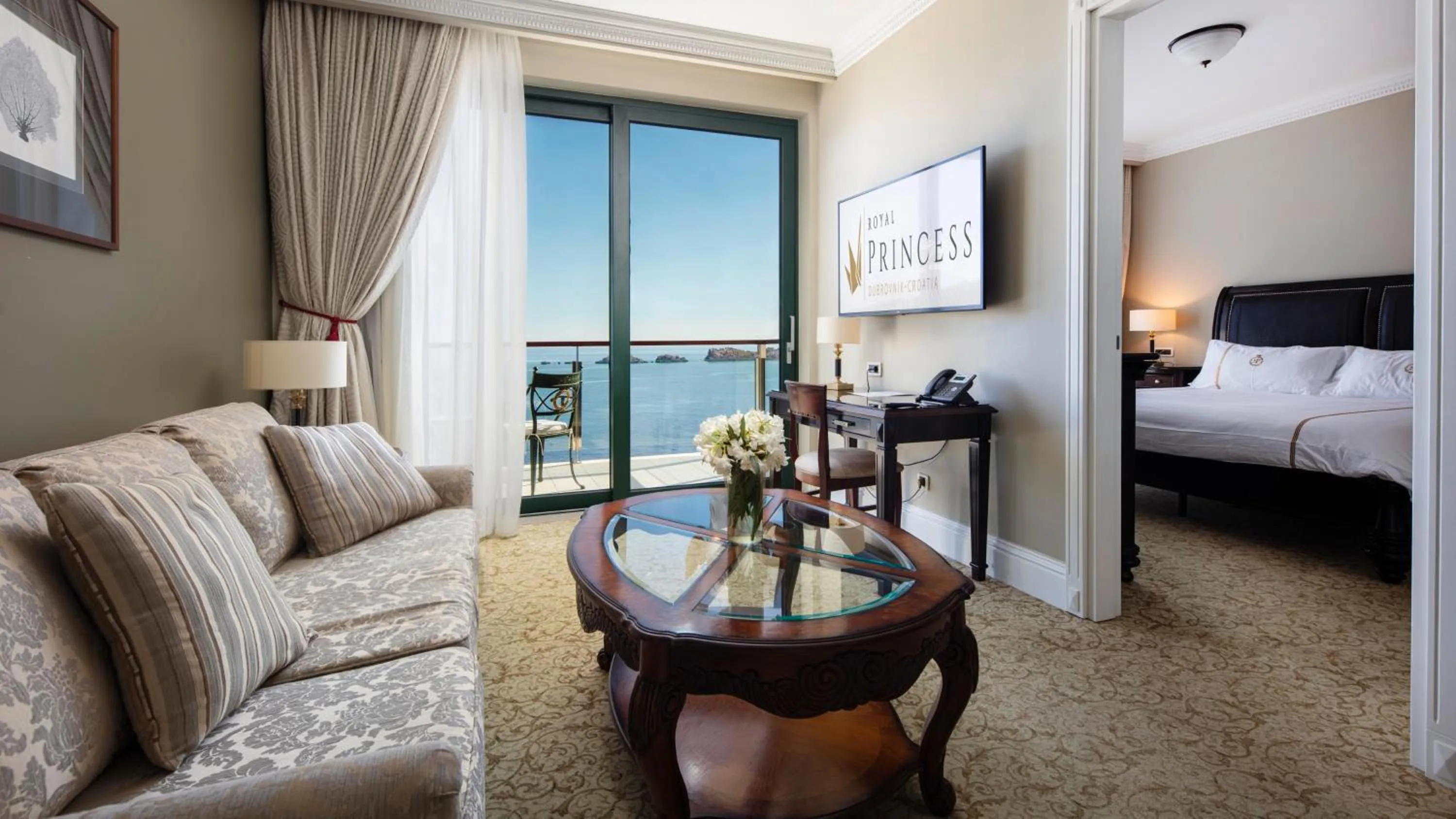 Living room, Bed in Royal Princess Hotel