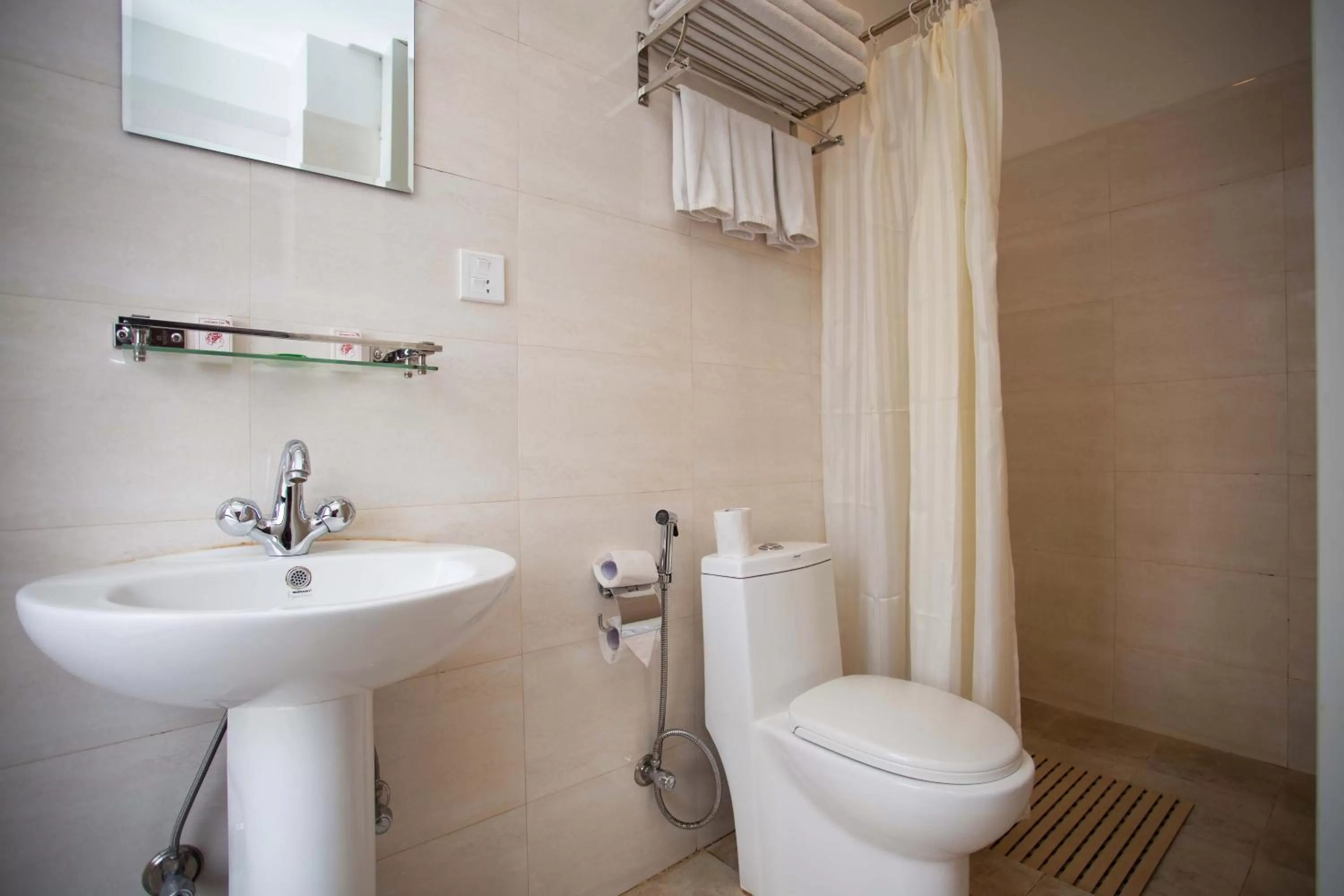 Bathroom in Hotel Jay Suites