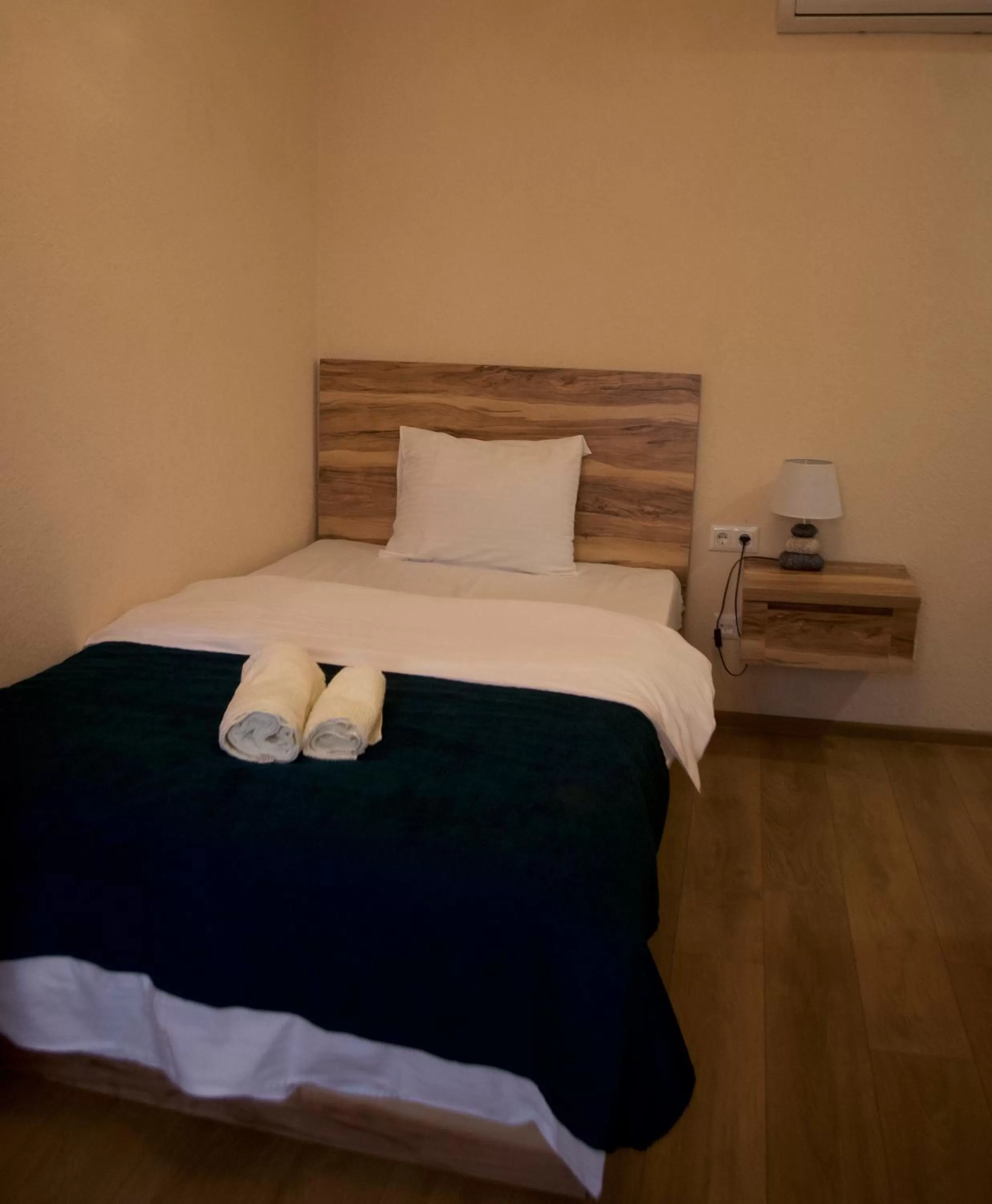 Bed in Bessarion Boutique Hotel