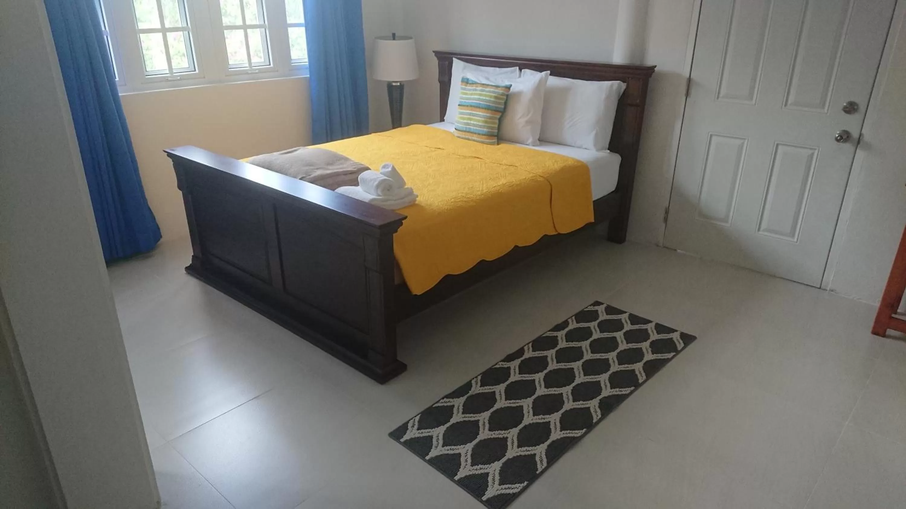 Bed in Classique International in Dominica