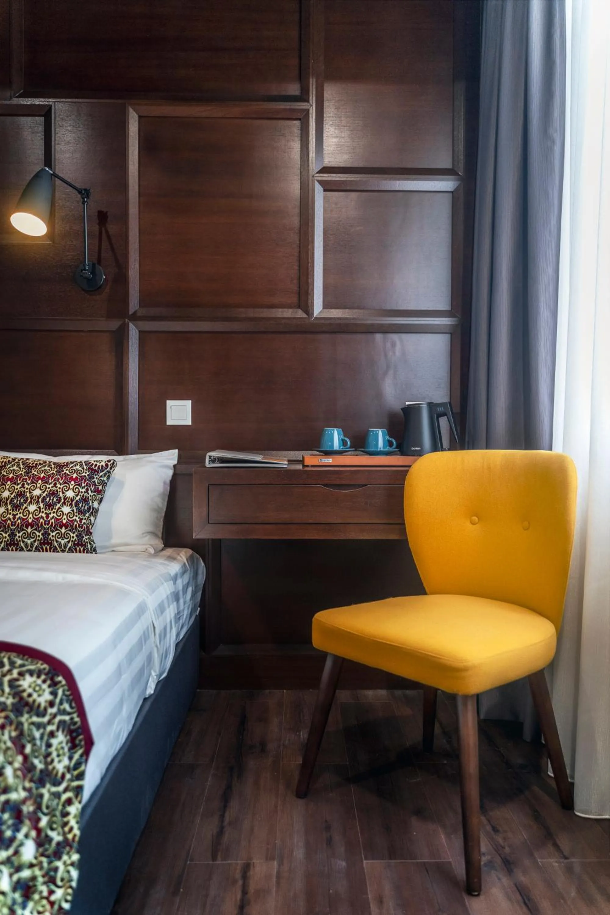 Seating area, Bed in East Riverine Boutique Hotel