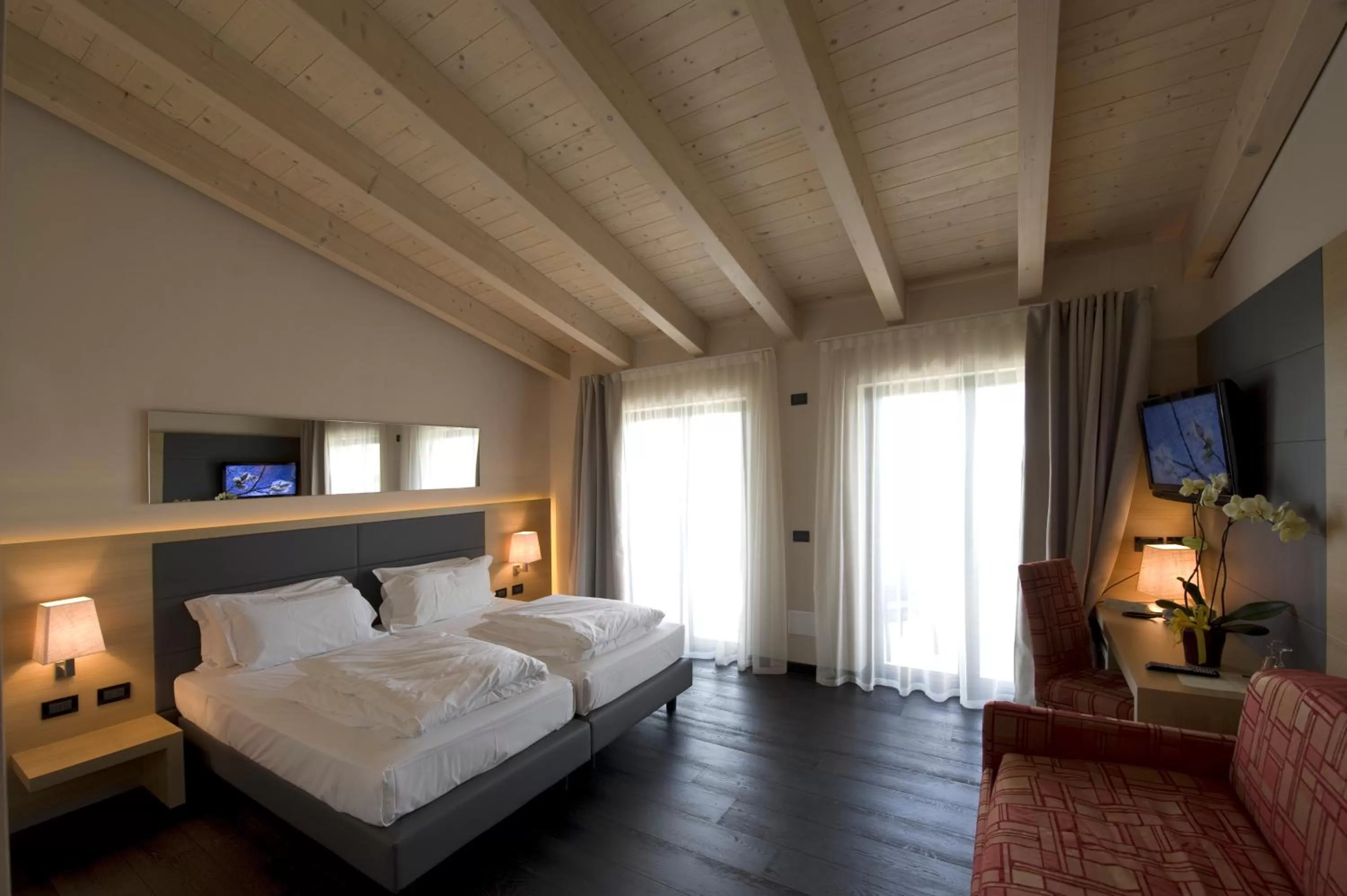 Bed in Villa Luisa Resort & Luxury Apartments