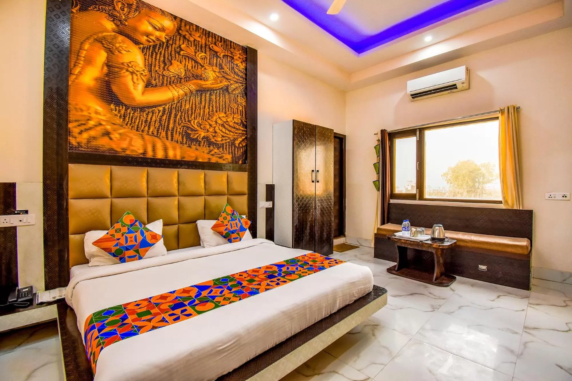 Bed in FabHotel Prime Sumanglam