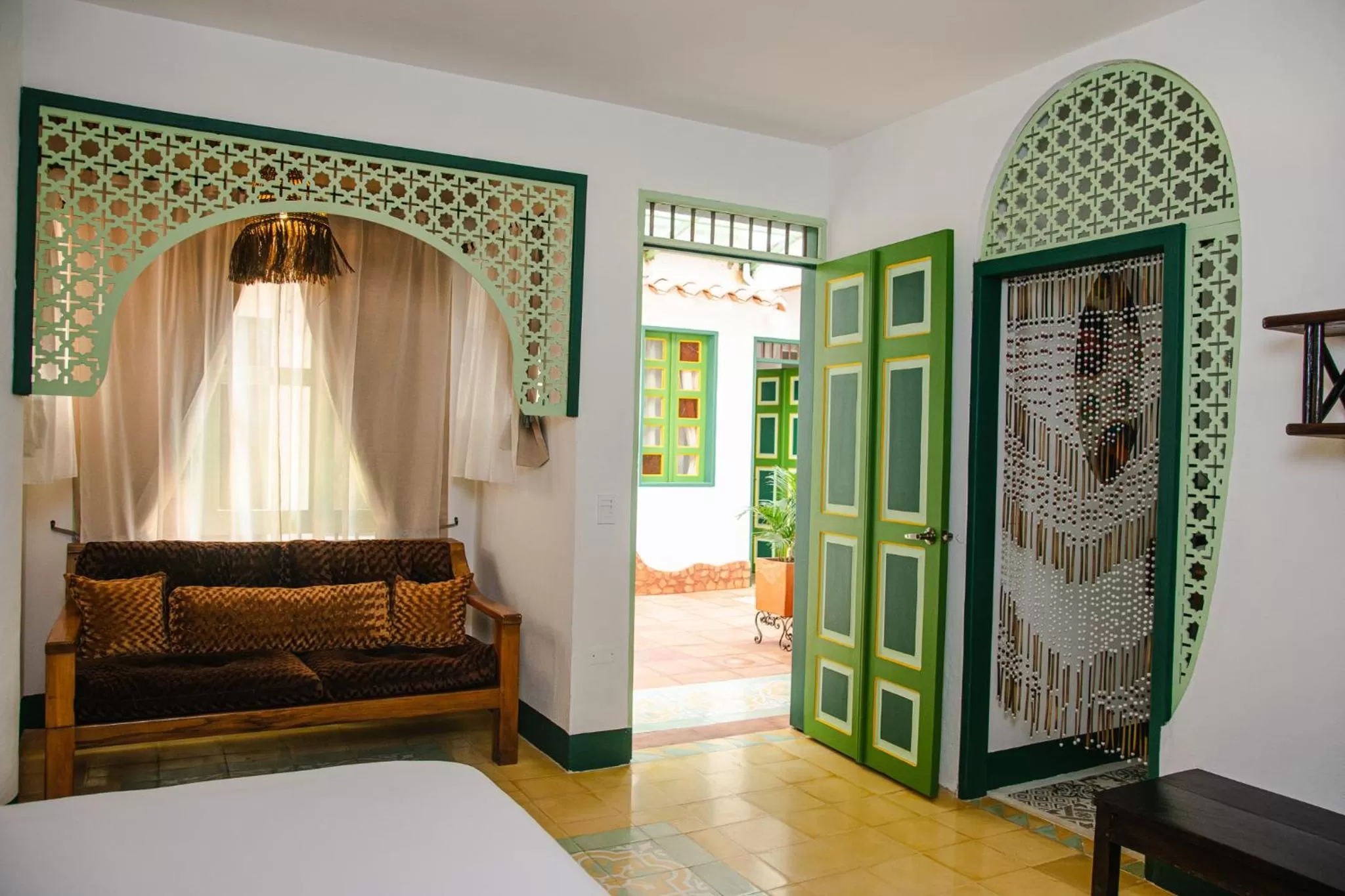 Seating area, Bed in El Despertar Hotel