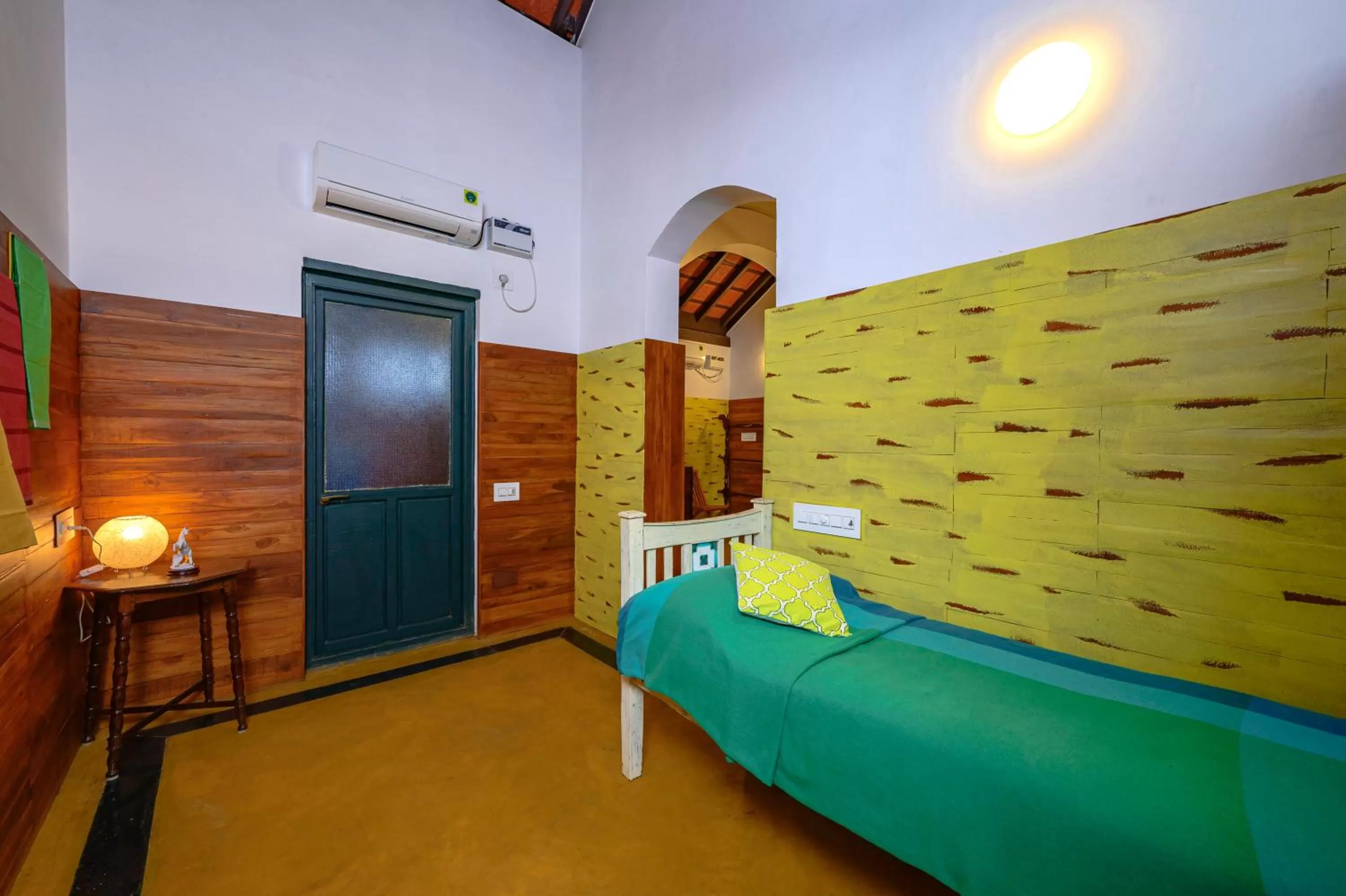 Bed in Neemrana's Coconut Alley