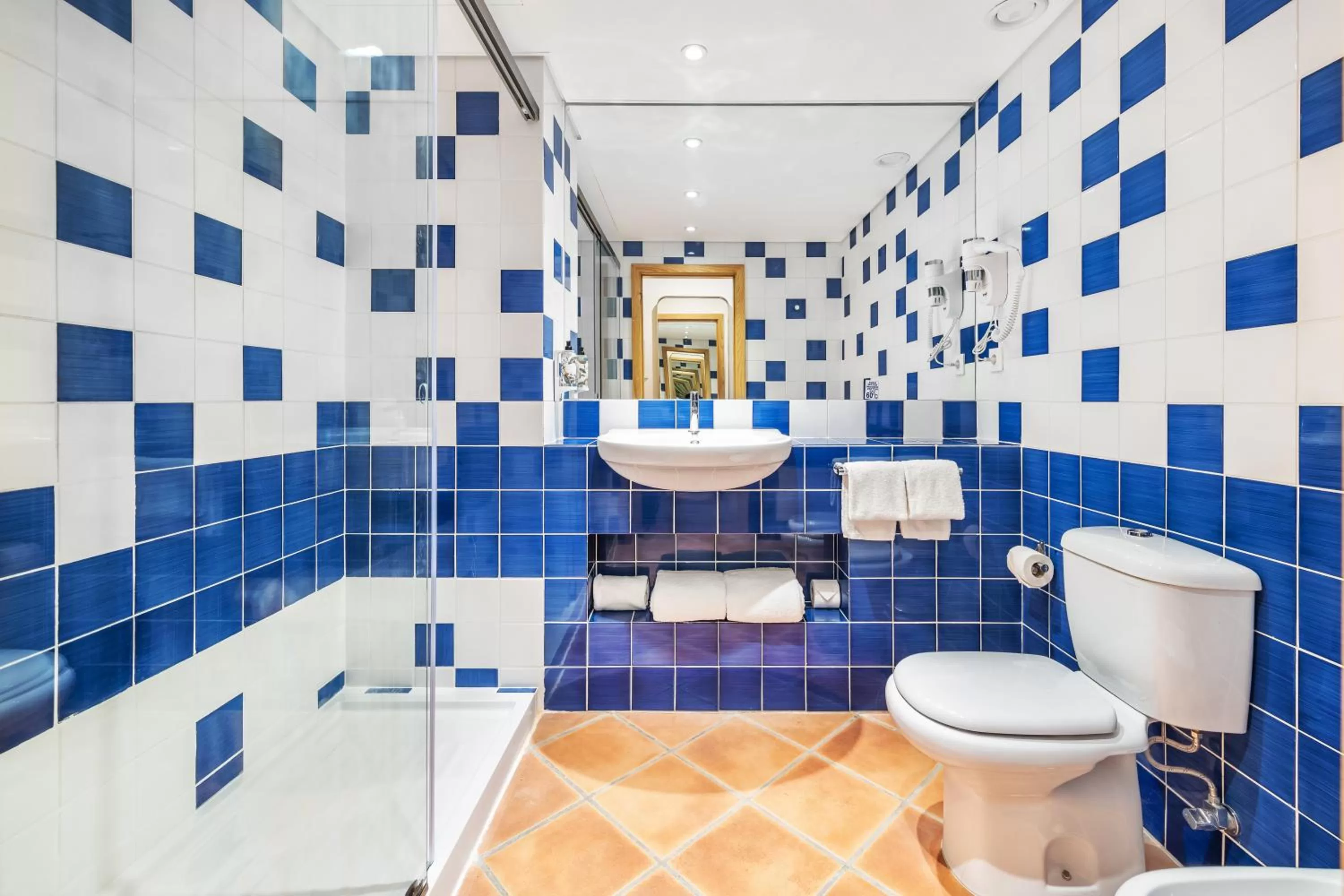 Shower in The Patio Suite Hotel