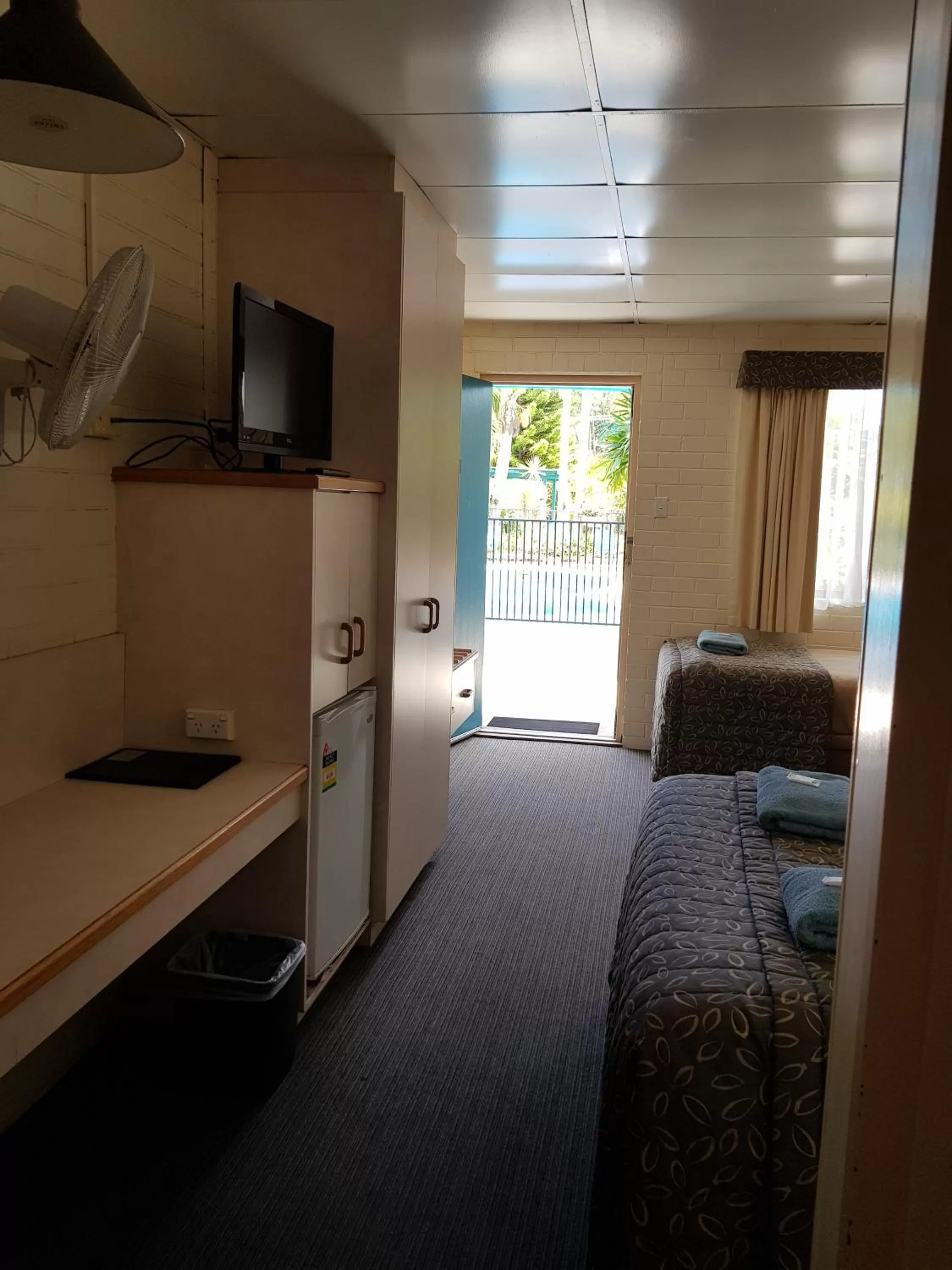 Bed in Peppercorn Motel