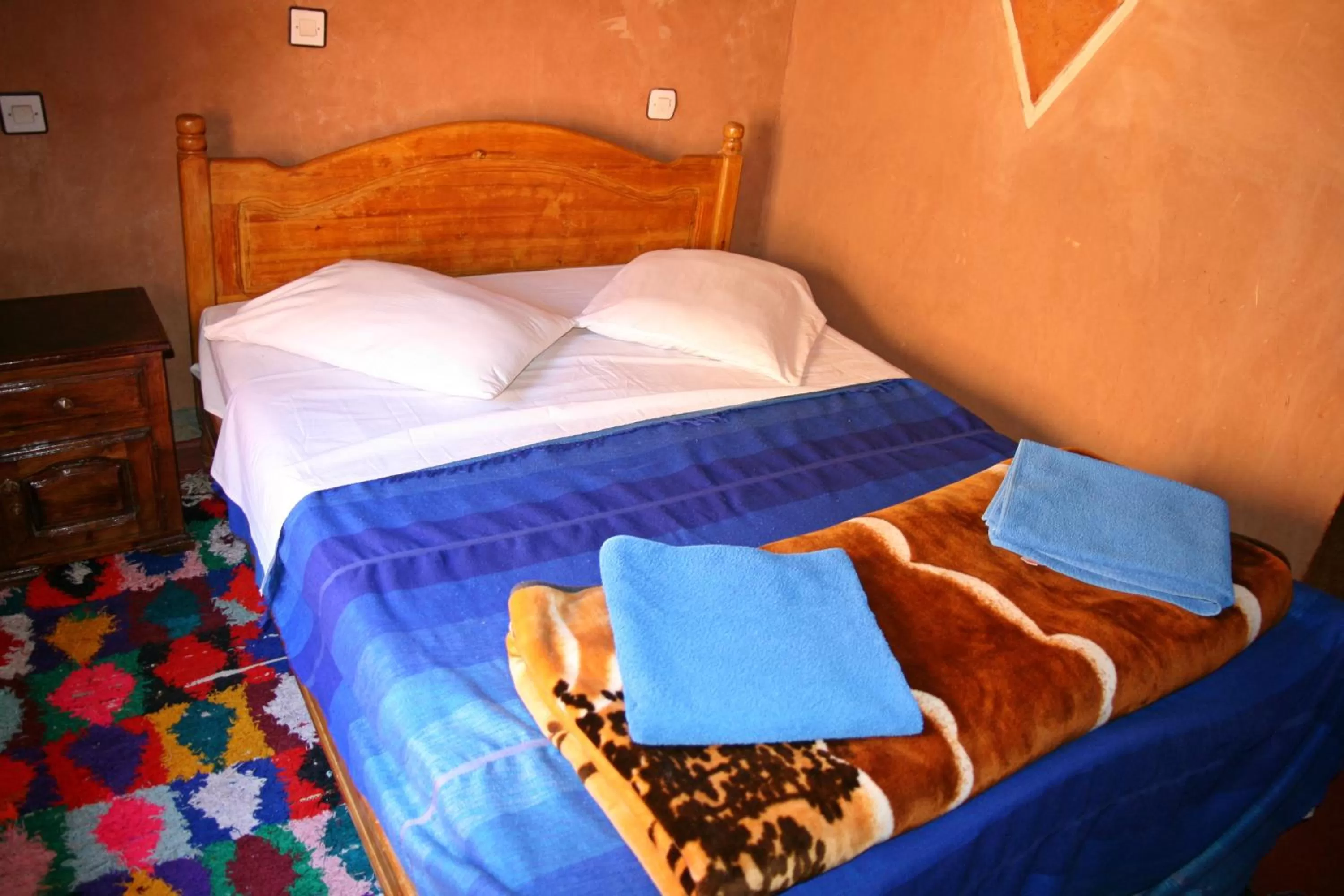 Bed in Maison d'Hôte Valentine