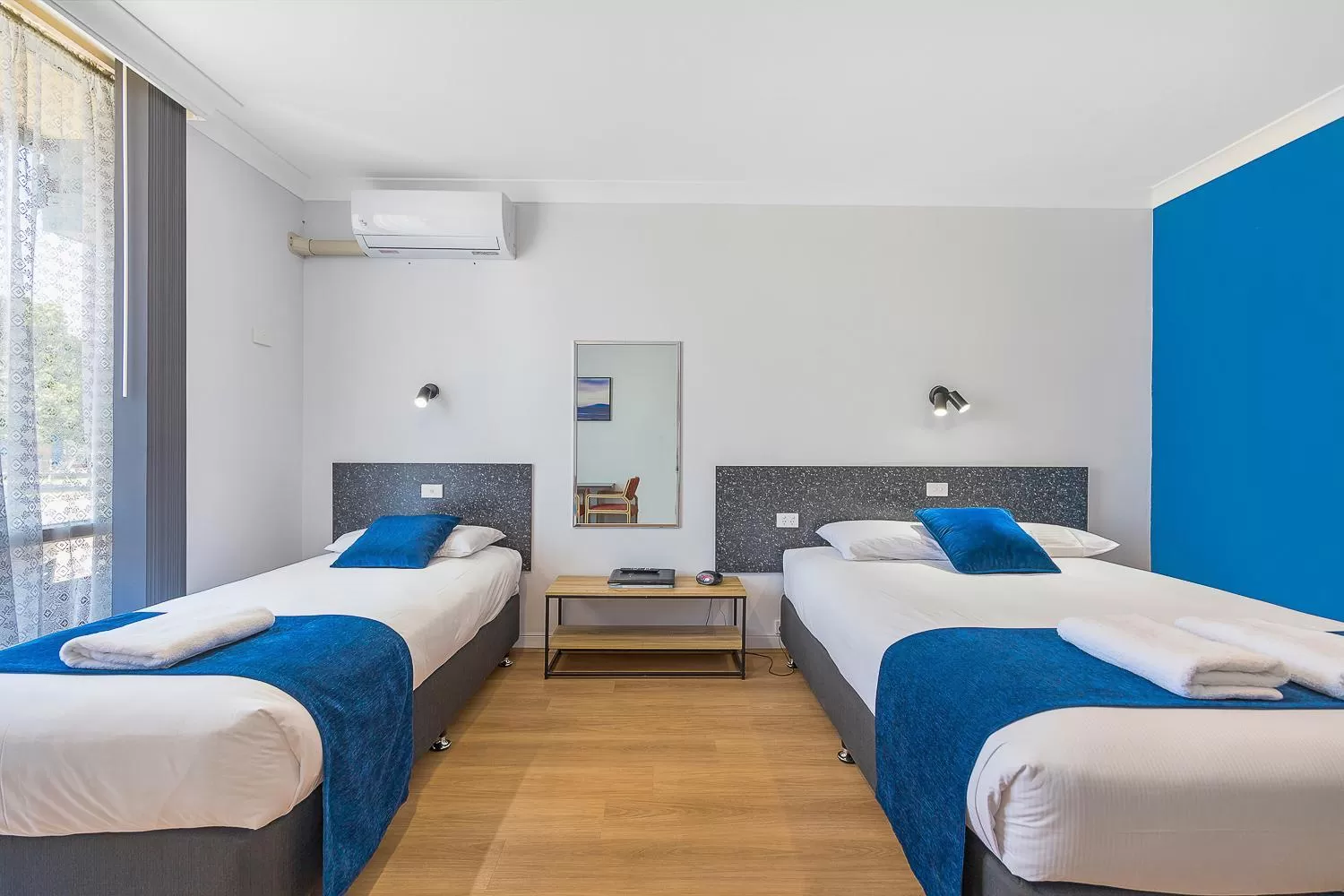 Bed in Plainsman Motel