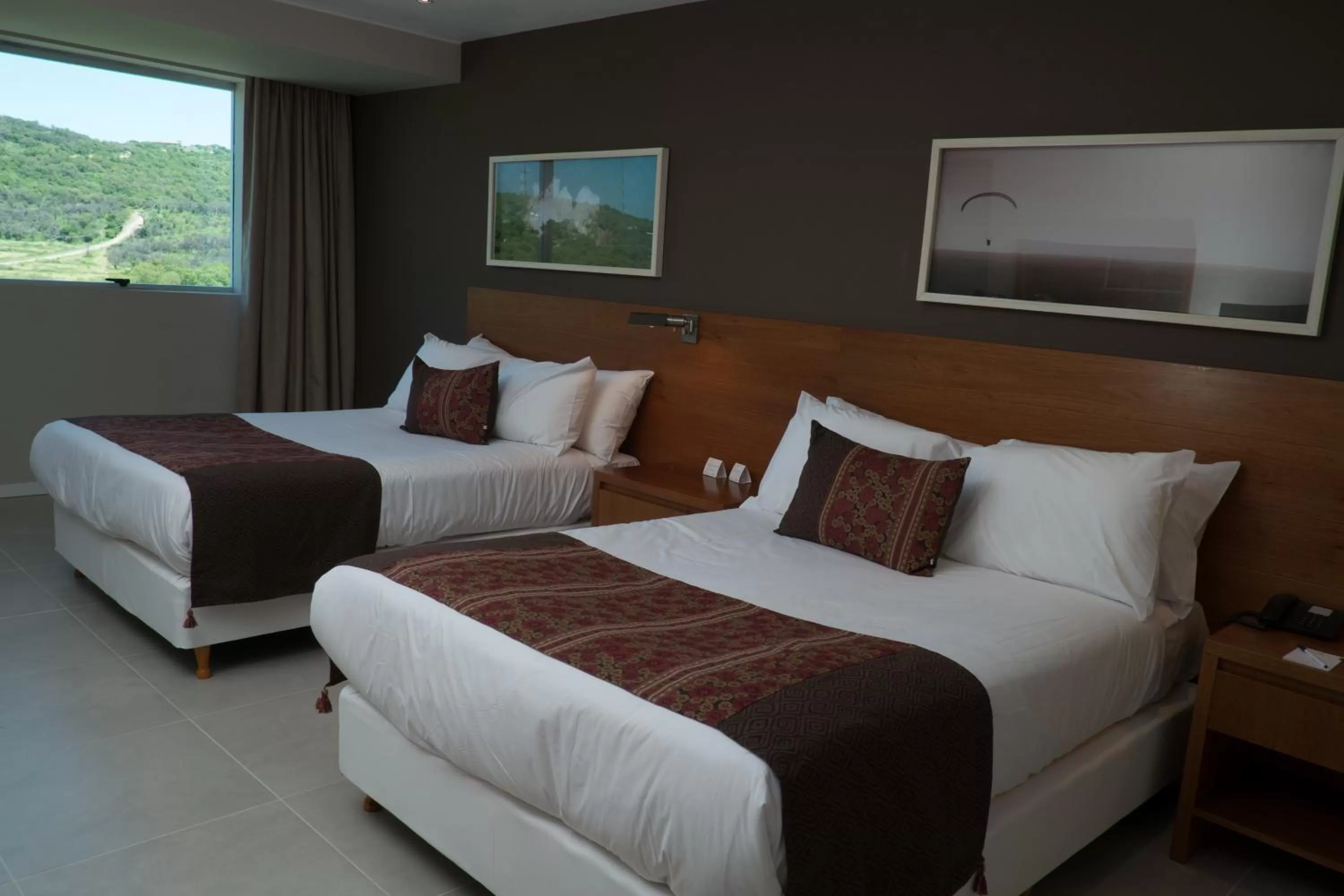 Photo of the whole room, Bed in Orfeo Suites Hotel Sierras Chicas