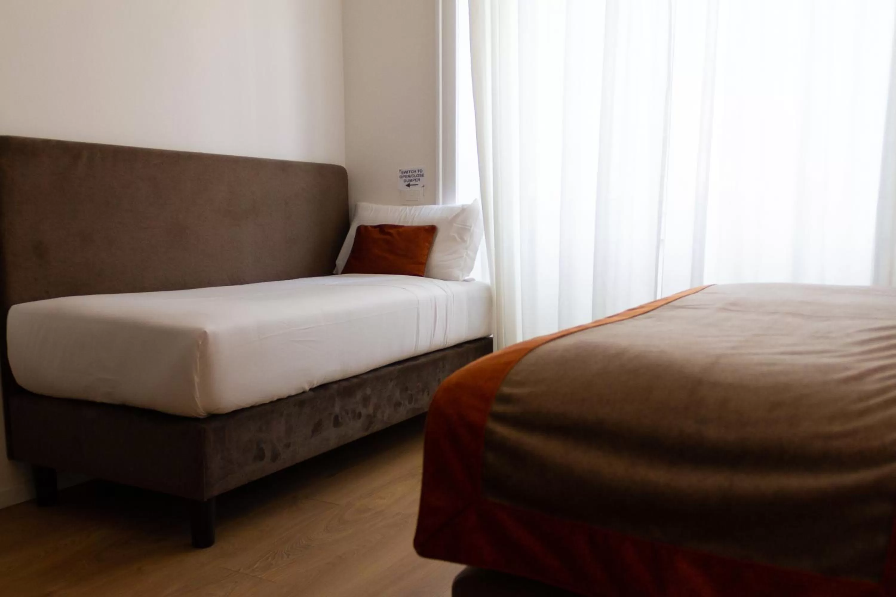 Bed in Michelangelo Vatican Rooms