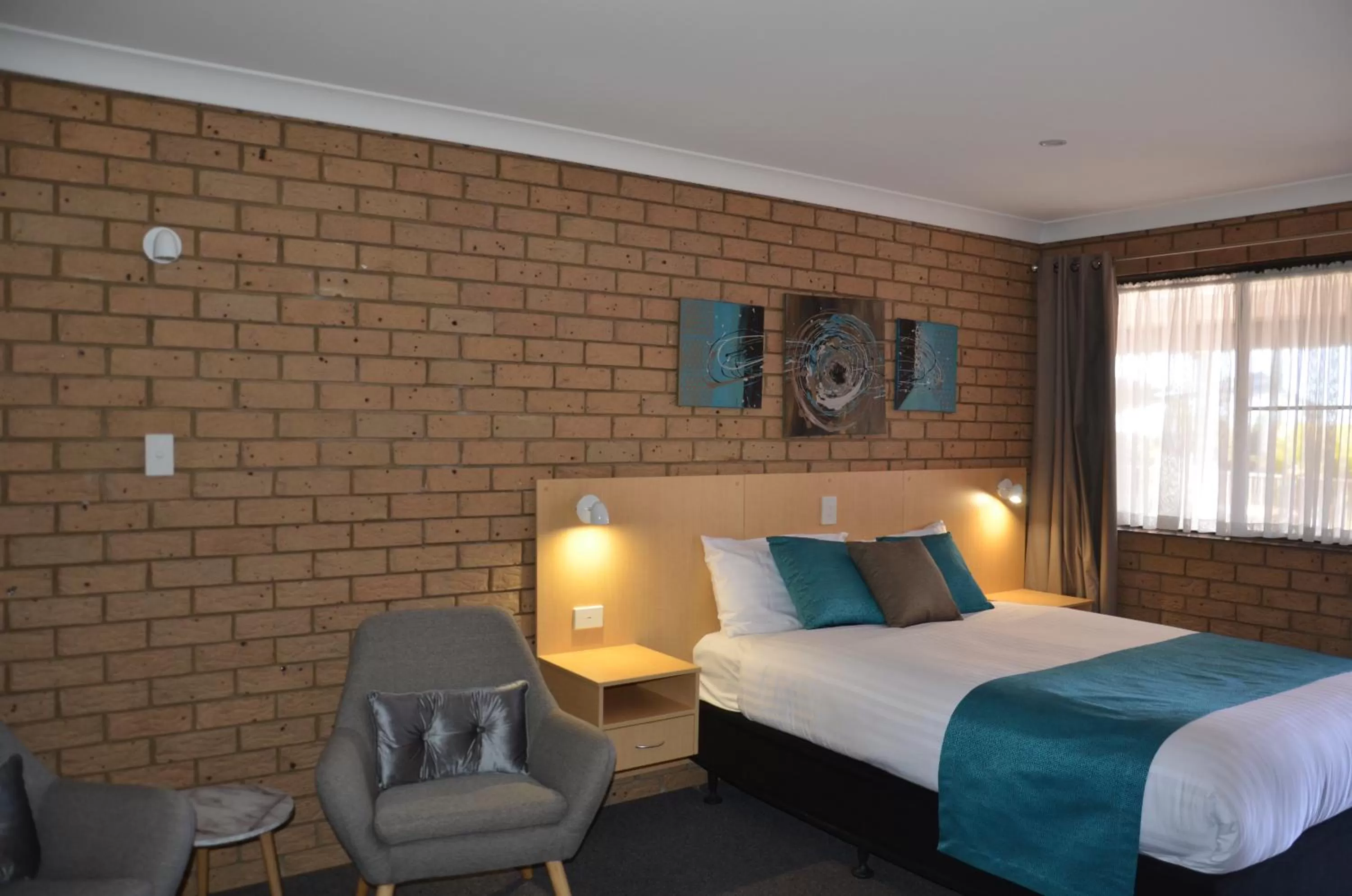 Bed in Sunray Motor Inn