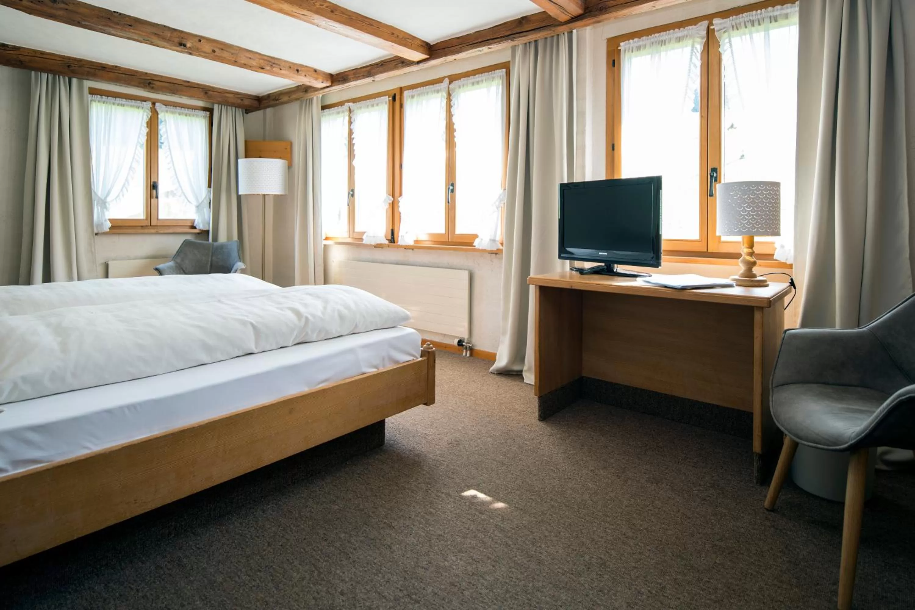 Bed in Hotel Alphorn