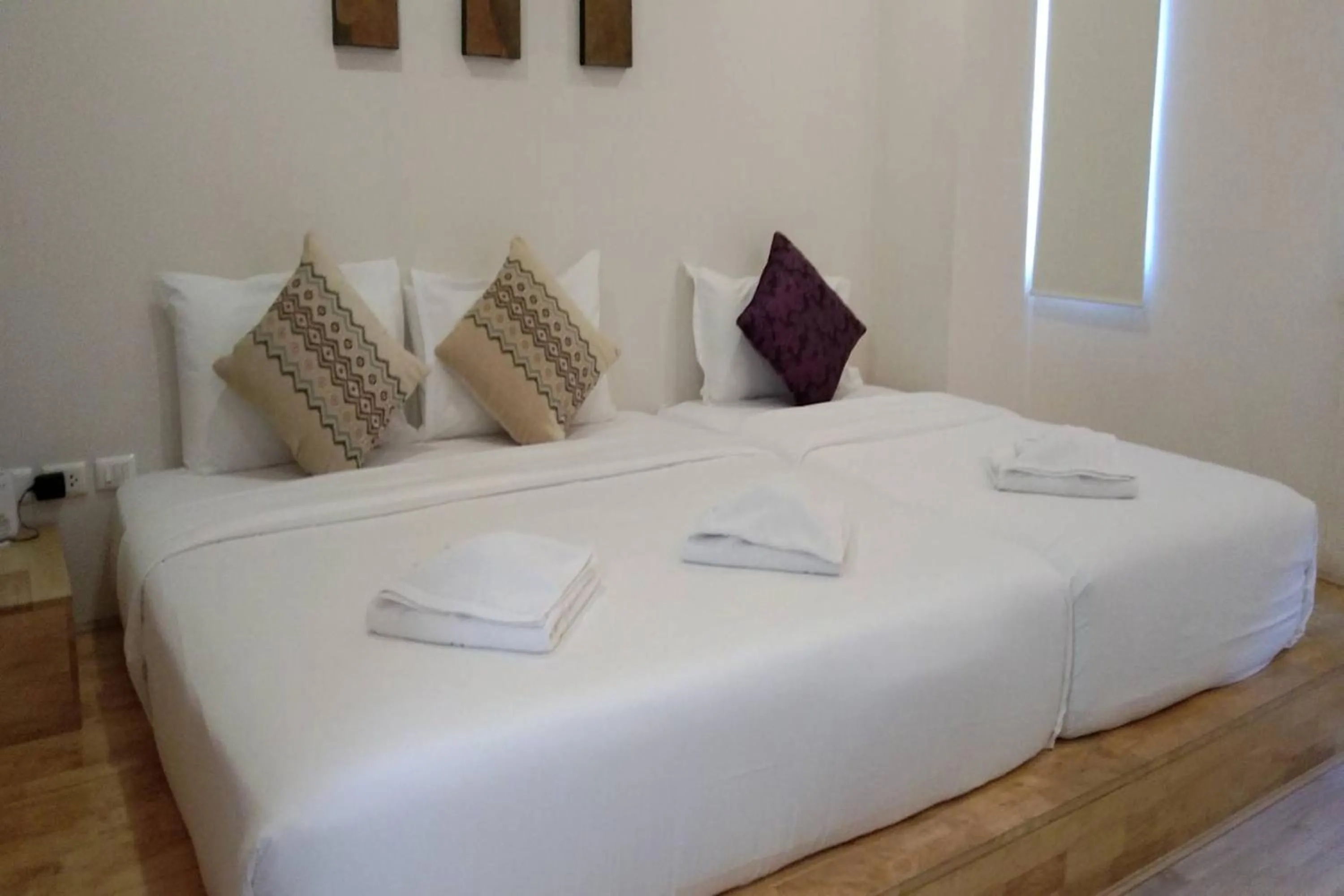 Bed in The Guest Arak Boutique Hotel
