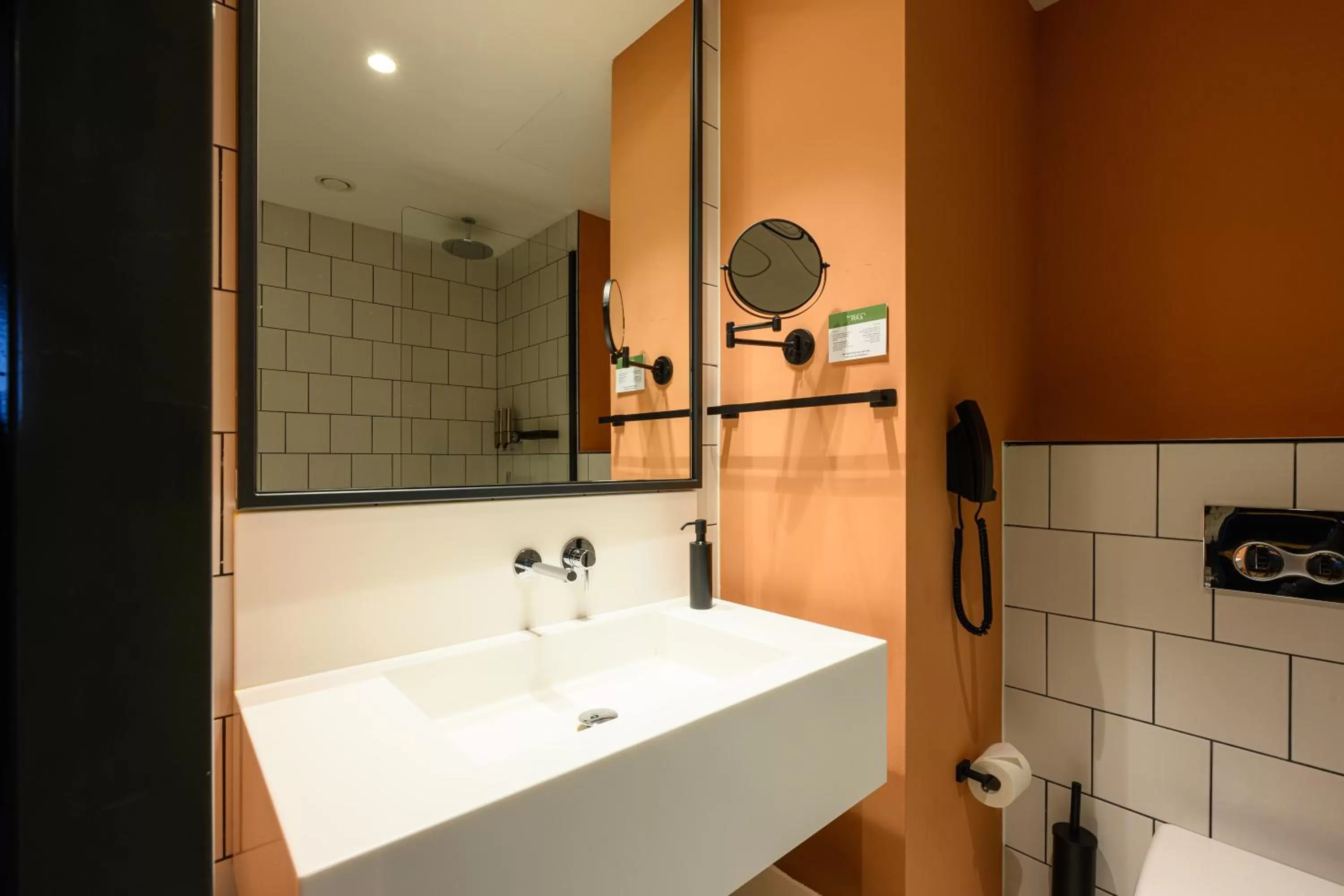 Bathroom in NEO KVL Hotel by TASIGO