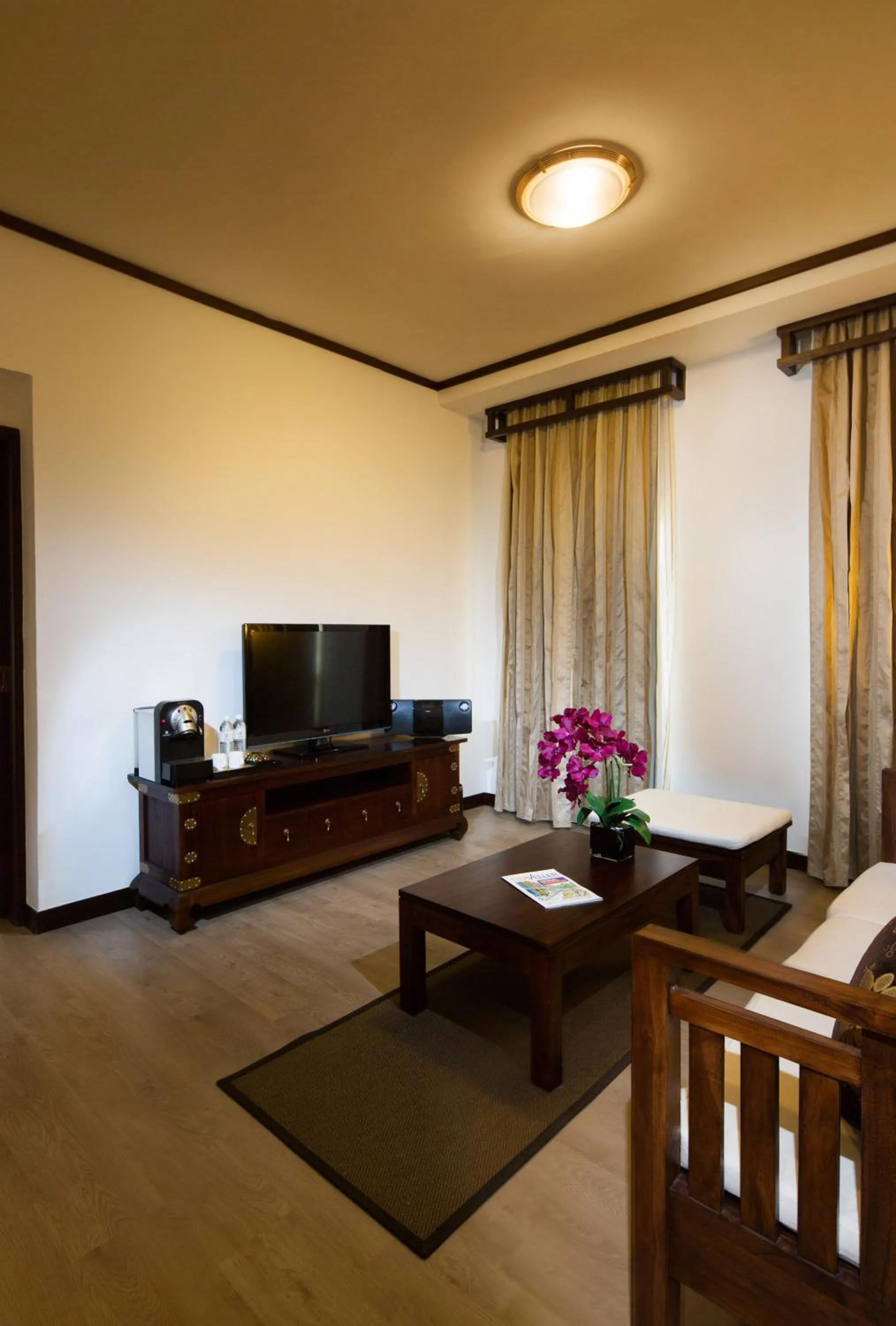 Living room in Village Hotel Albert Court by Far East Hospitality