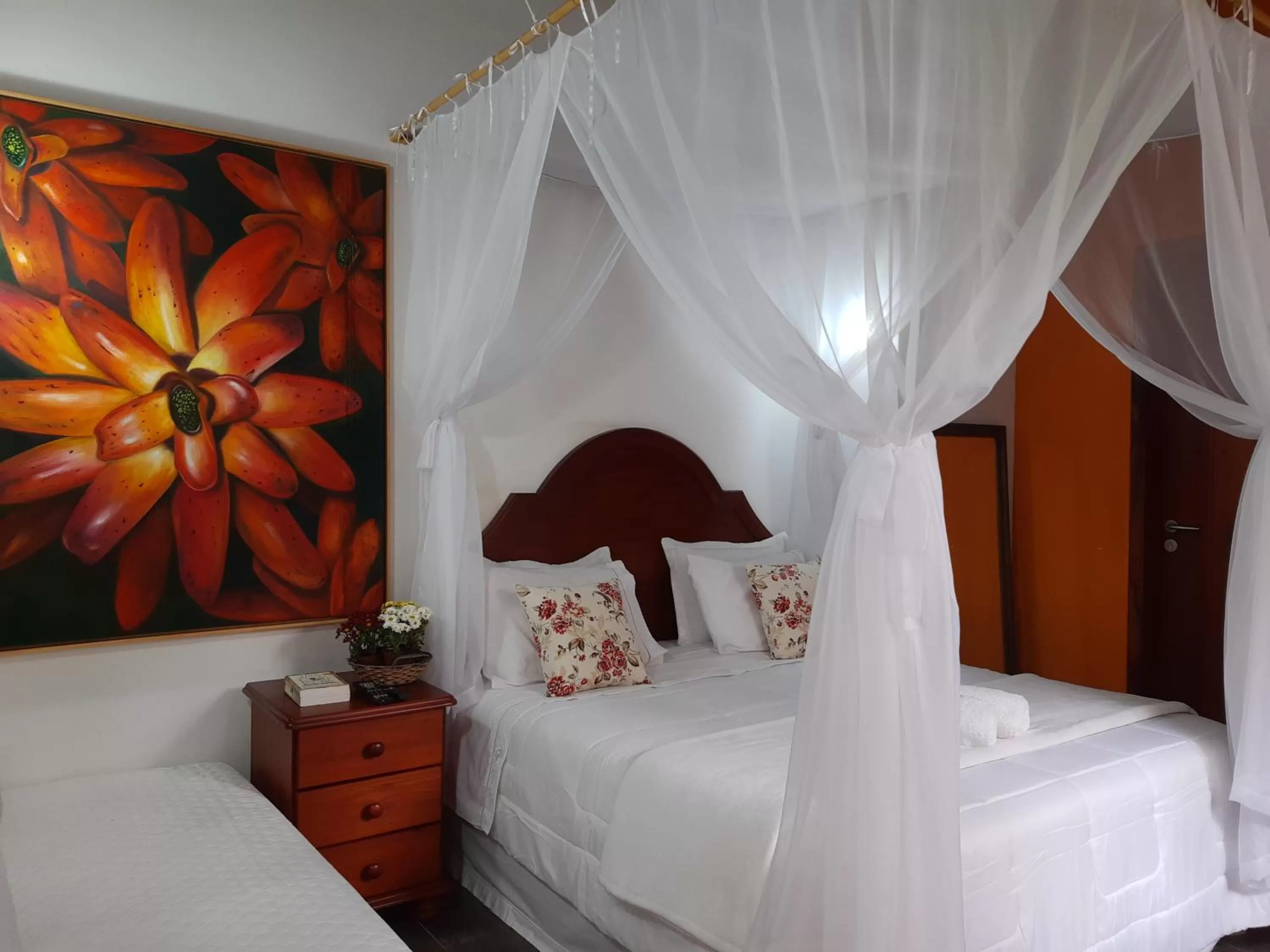 Bed in Magias de Paraty Ecopousada